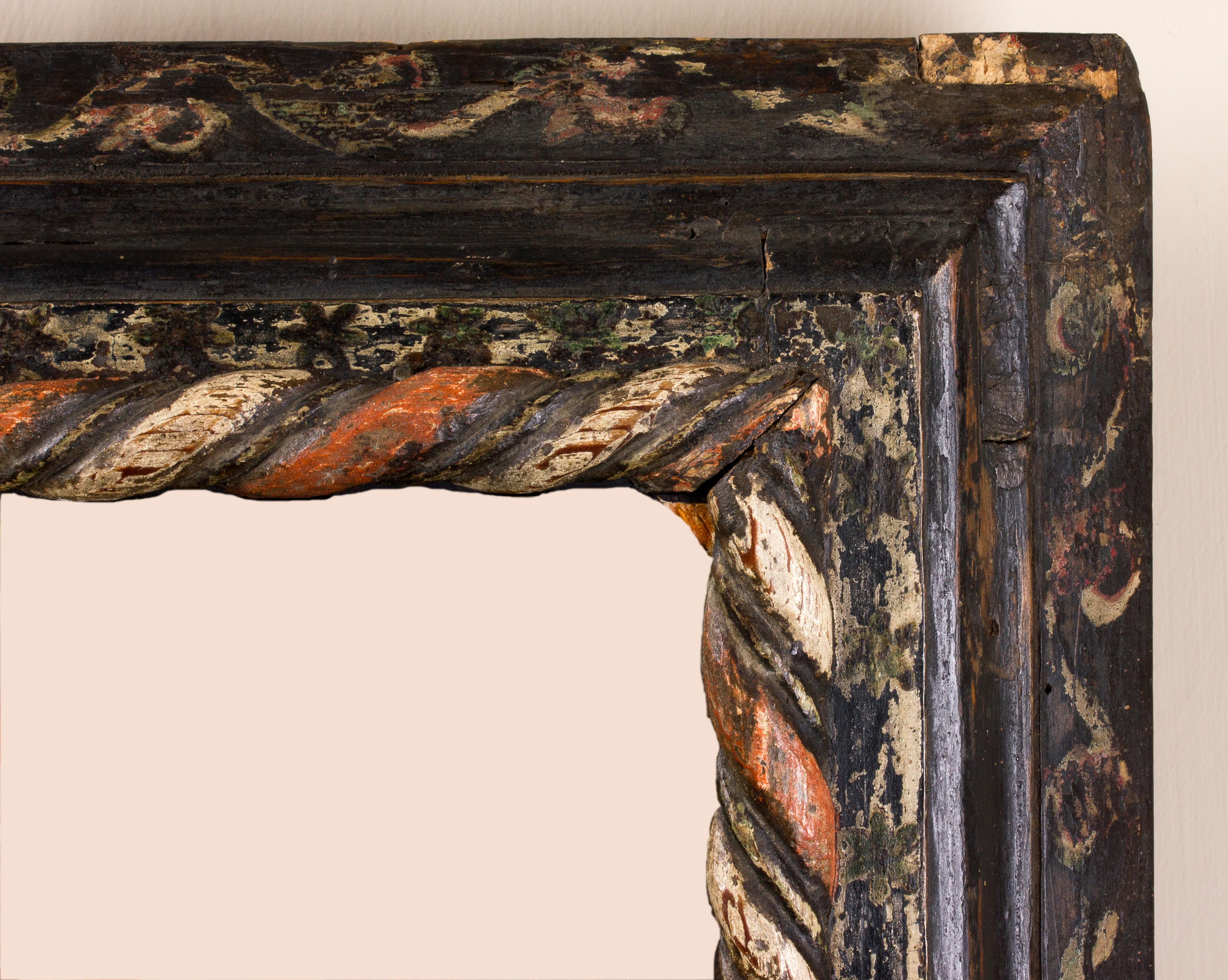 Central and northern Italy frame, 17th century
Mixtilinear profile with polychrome decoration of flowers, leaf patterns and twisted rope.
Inside: 32.7 x 40.8 cm; outside: 40 x 48.5 cm.
Depth is the wide of the band.
    