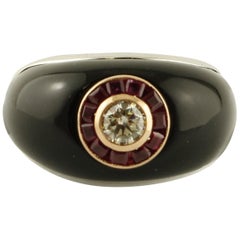 Central Diamond, Rubies, Onyx, 18 Karat White and Rose Gold Ring