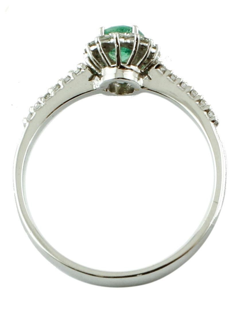 Brilliant Cut Central Emerald, Diamonds, 18 Karat White Gold Ring