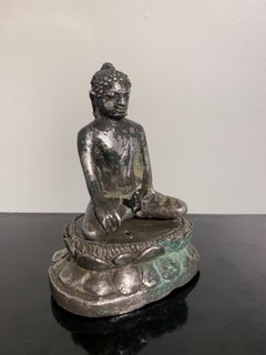 Central Javanese Cast Silver Transcendent Buddha, 9th-12th Century, Indonesia