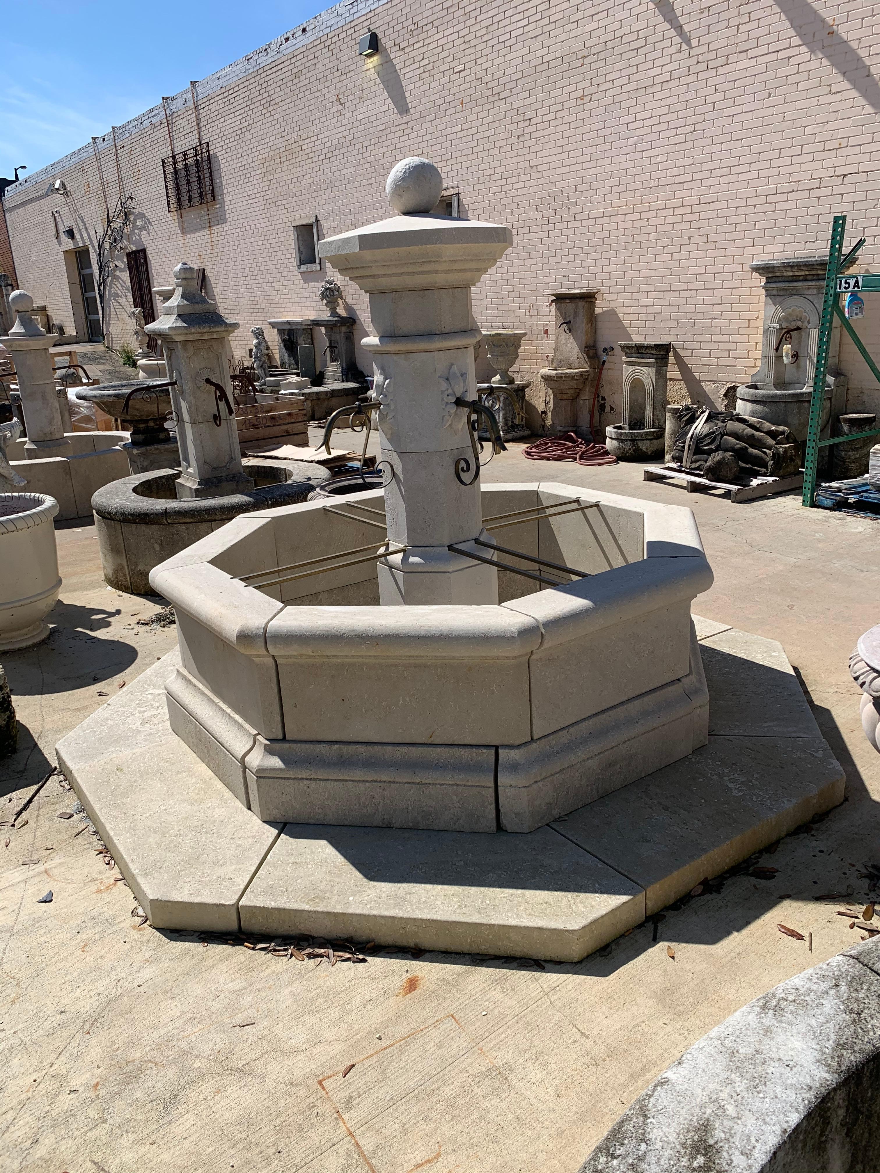 Here we have a hand carved limestone central fountain from France with an octagonal surround. There is a flower motif at the base of each of the four spouts and a round finial on top of the fountain.

Origin: France

Measurements:

Overall