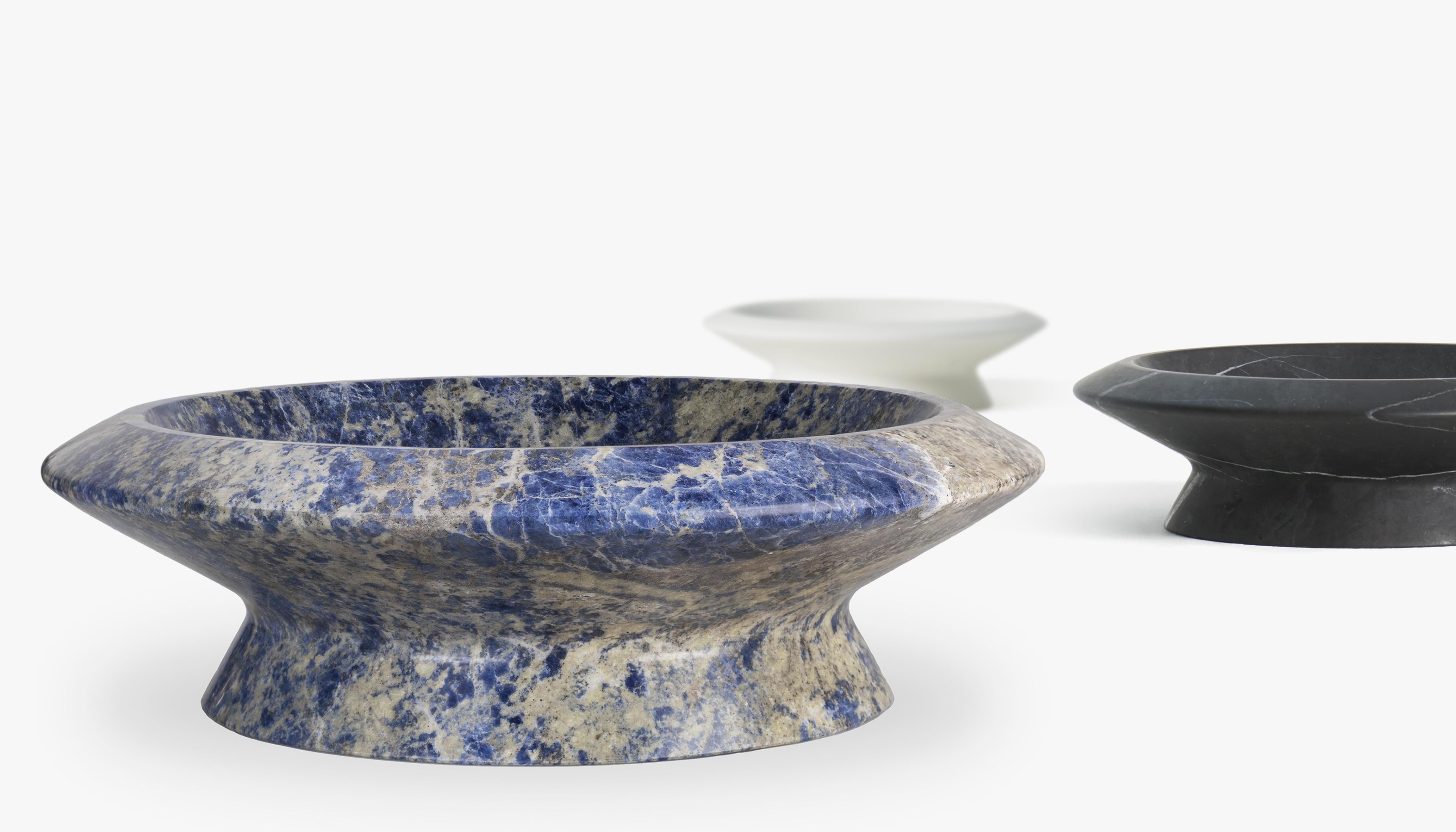 Centrepiece in Blue Sodalite marble, designed by Ivan Colominas - available in other marble colours.

Mmairo loves wining and dining, good food and entertaining and, it loves marble. In the kitchen it is the perfect material: pure, smooth and easy