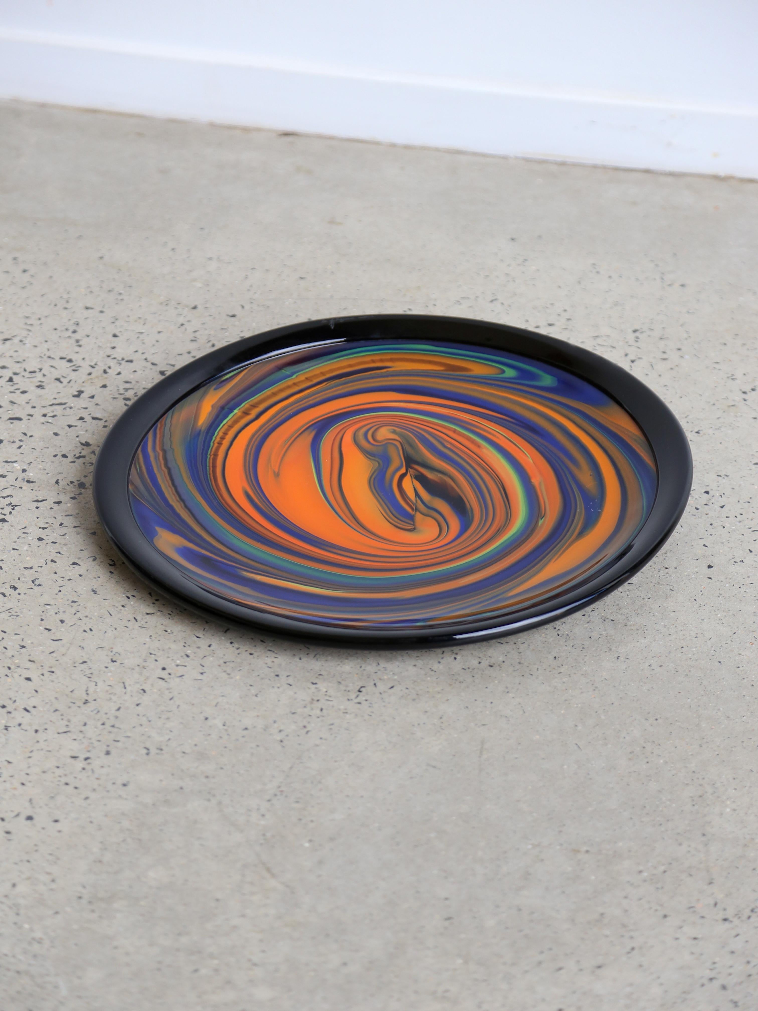 Large plate decorative object centrepiece or empty pockets model Mercucio 1104 designed by Missoni and produced in the 1980s by the Italian company Arte Vetro Murano. The object was made by hand in polychrome and black overlaid Murano glass with