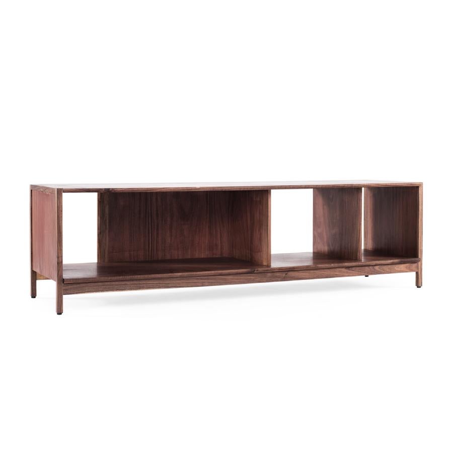 A simple piece with a wide variety of uses. Its open niches generate visual lightness, and can be occupied with ornaments. Produced in three different types of wood: tzalam, walnut and oak. Every piece is handmade in Mexico City with national