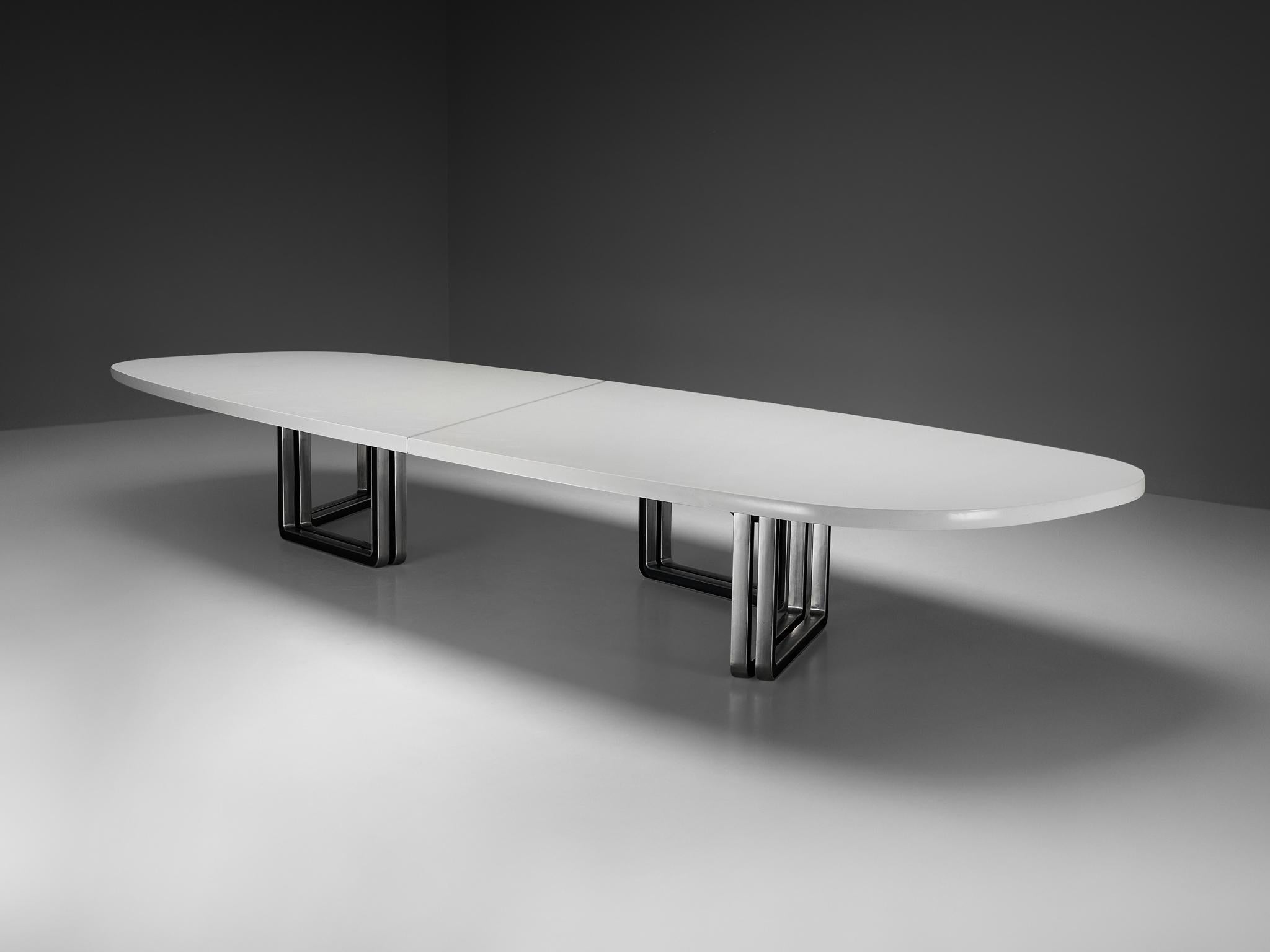 Centro Progetti Tecno, conference table model 'T335', lacquered wood, aluminum, Italy, 1975-1978

Large conference table with an off-white lacquered wooden top that has an incredibly size. The table is composed of two parts that are visually