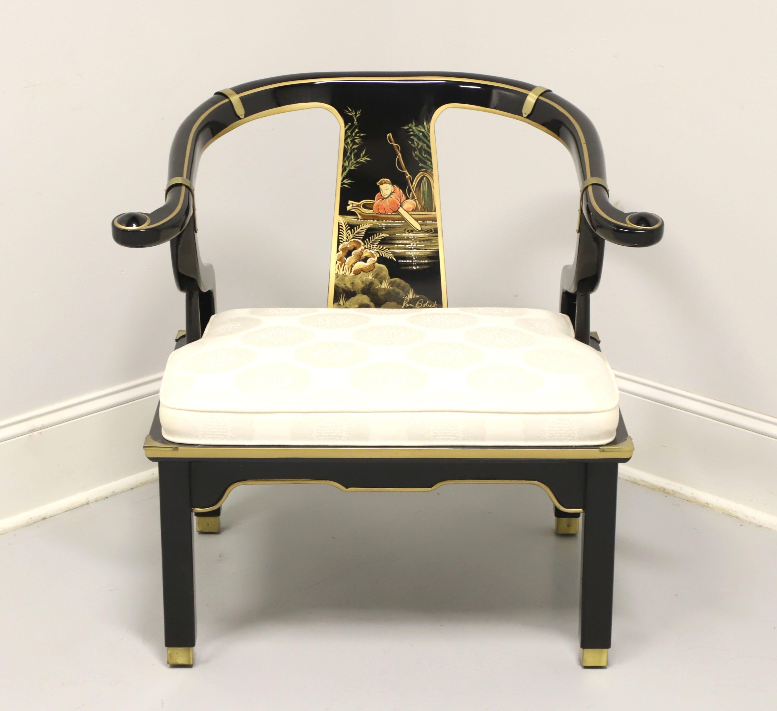 An Asian Chinoiserie Ming style horseshoe armchair in a James Mont design by Century Furniture, hand painted for them by Pam Bolick. Solid wood frame with black lacquer, gold painted accents, custom painted backrest, horseshoe shaped arms, carved