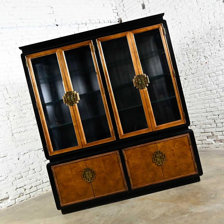 Stunning vintage chinoiserie Chin Hua double display, China cabinet, or bookcase by Raymond K. Sobota for Century Furniture. Comprised of white ash burlwood with ebonized maple accents, brass hardware, lighted cabinet with 3/8-inch glass shelves