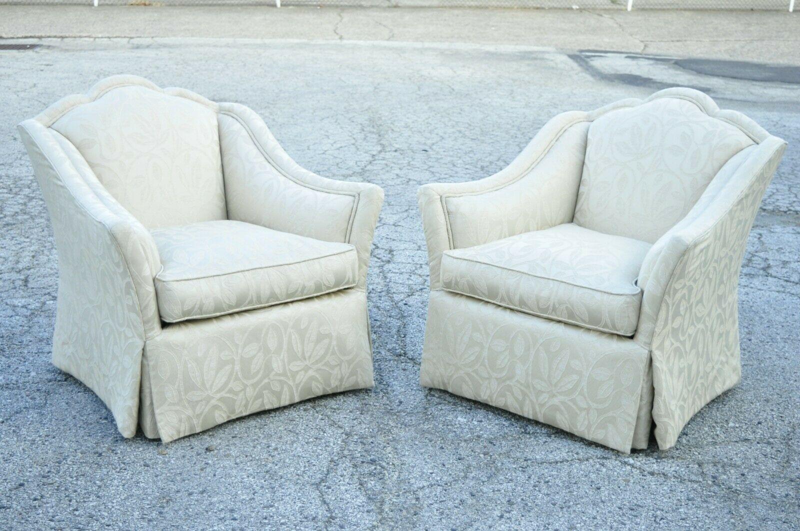 Century Furniture Beige 11-909 living room reading club lounge chairs - a pair. Item features shapely swooping arm, hump back, skirted frame, beige upholstery with floral print, quality American craftsmanship, great style and form. Circa 21st