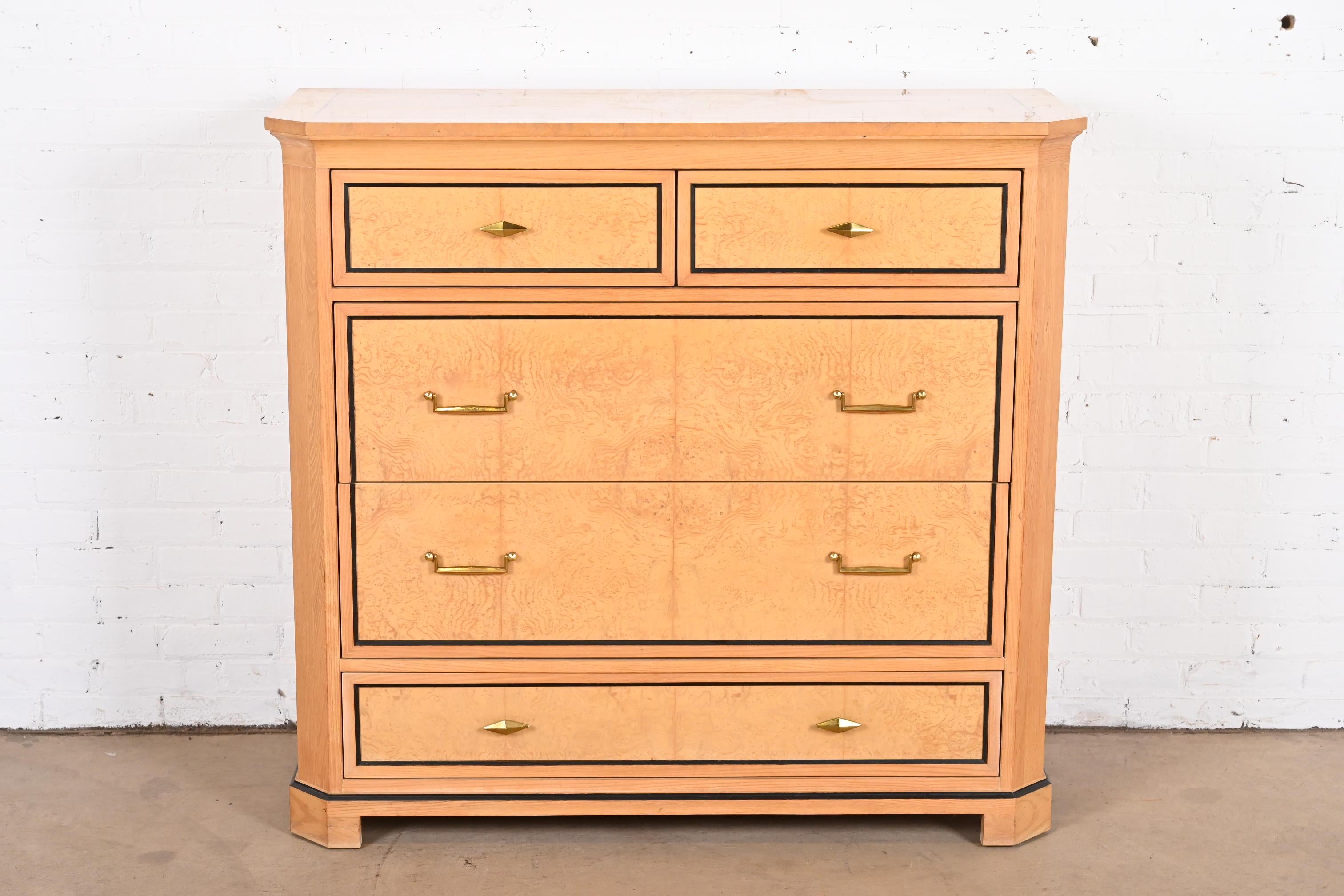 A gorgeous Biedermeier or neoclassical style dresser or chest of drawers

By century Furniture

USA, late 20th century

Oak, with beautiful book-matched burl wood drawer fronts and top, ebonized trim, and original brass hardware.

Measures: