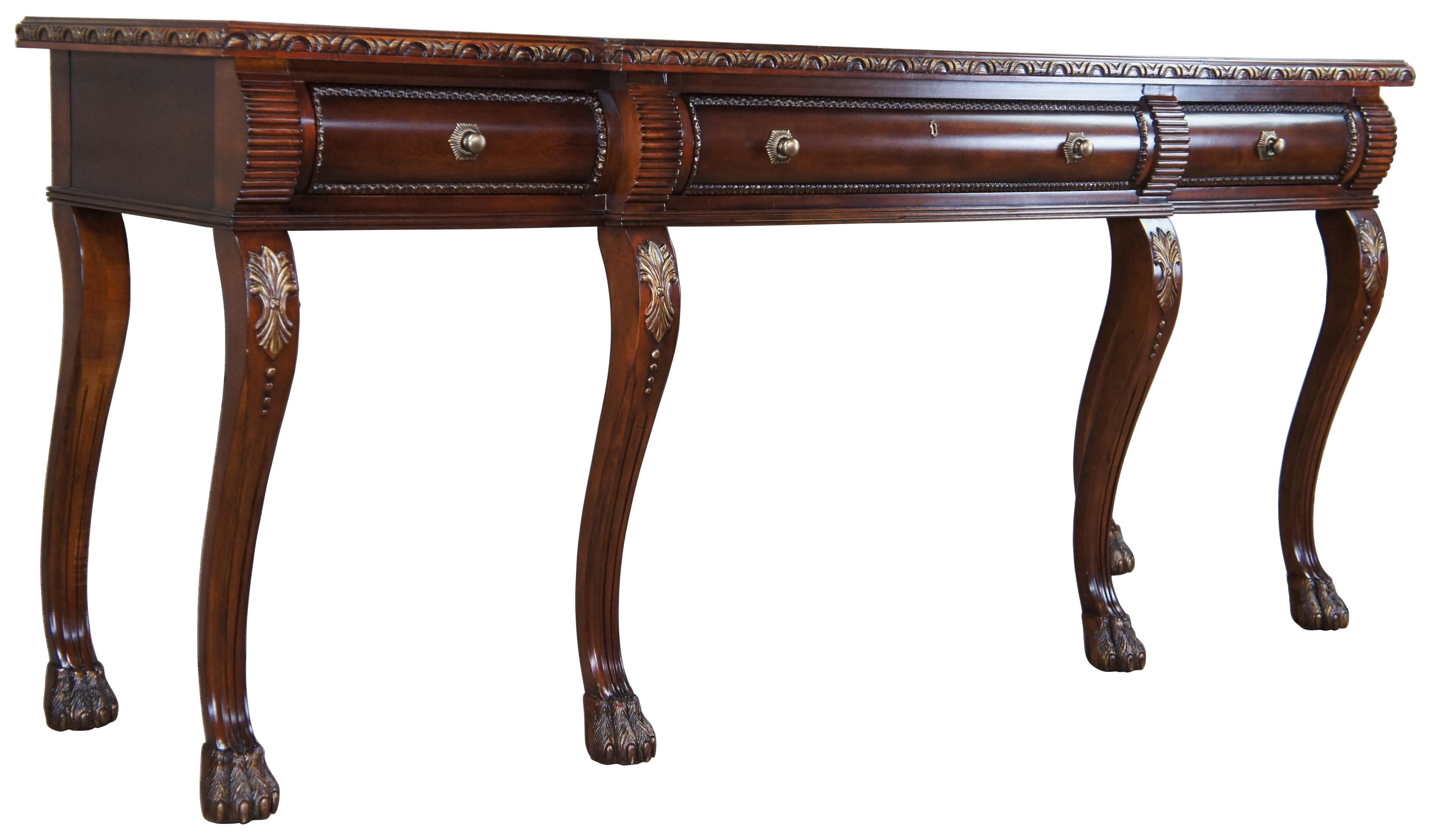 Century Furniture Chippendale sideboard. Features a rectangular form with breakfront over 3 drawers and 6 swooping cabriole legs leading to paw feet. Includes a brushed gilt finish, gadrooning, fluting, carved crests and brass hardware. Great for