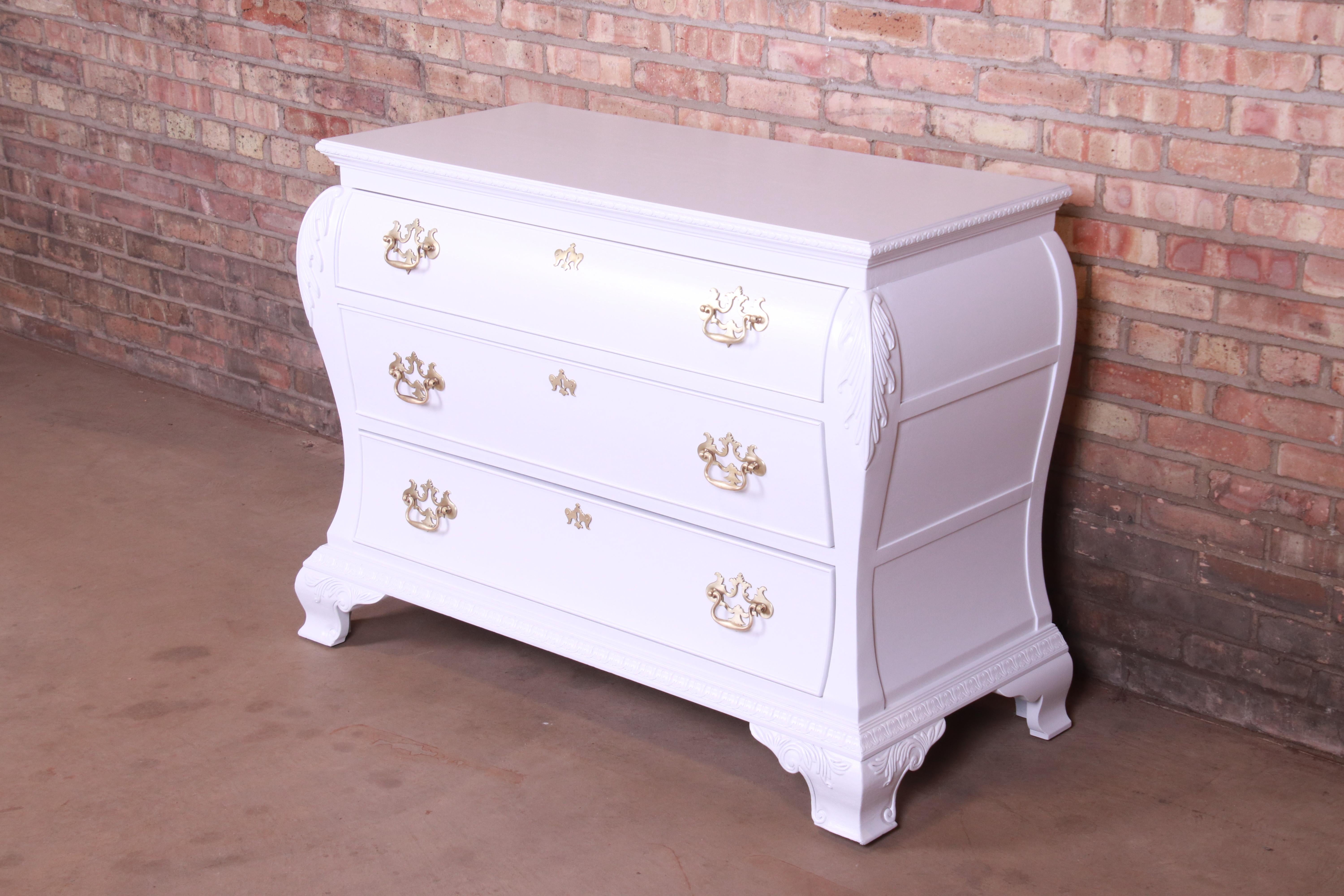 An exceptional Chippendale style three-drawer bachelor chest or dresser

By Century Furniture,

USA, circa 1980s

White lacquered mahogany, with original brass hardware.

Measures: 46.5