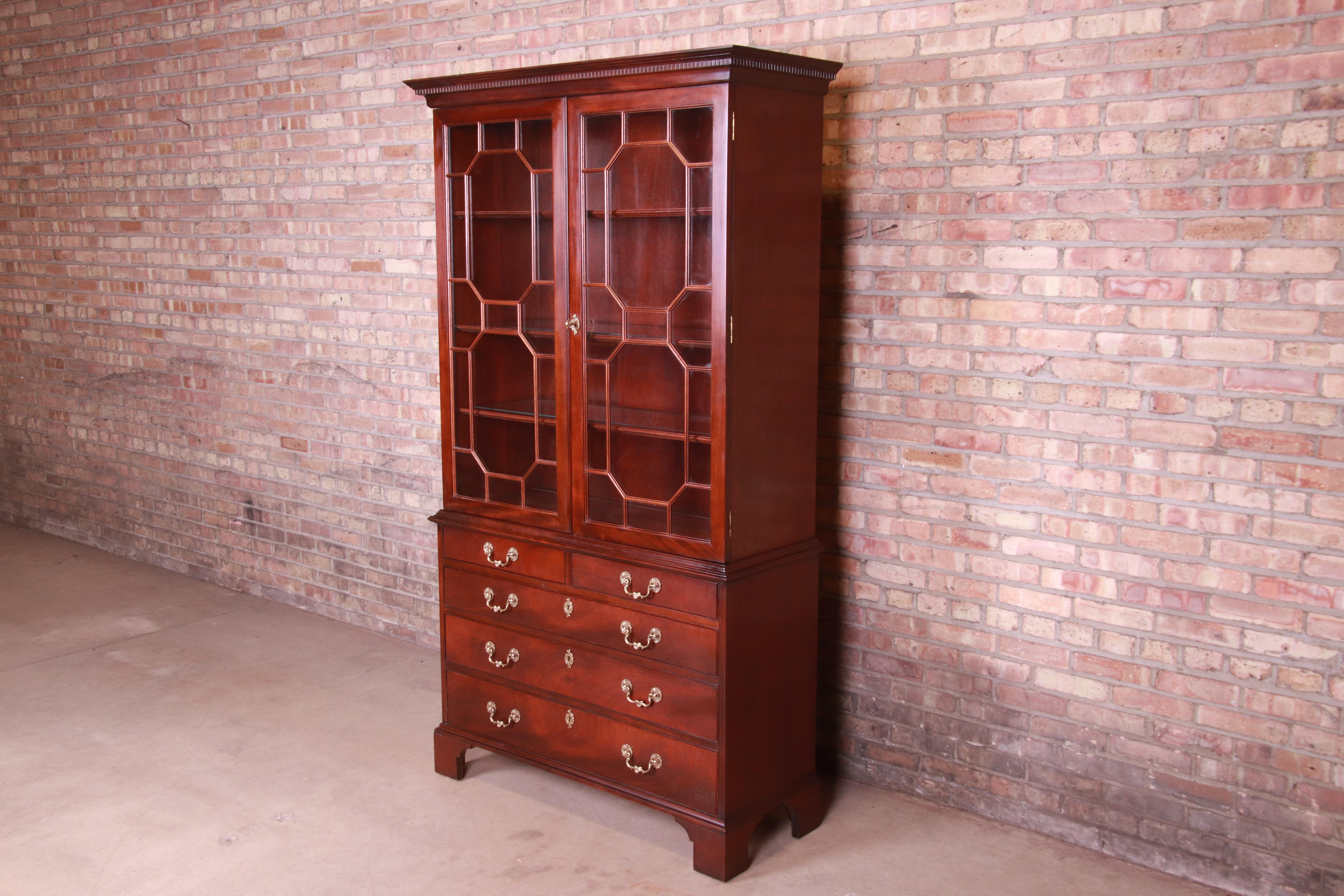 An exceptional English Chippendale style bureau with lighted glass front bookcase or bar cabinet

By Century Furniture 