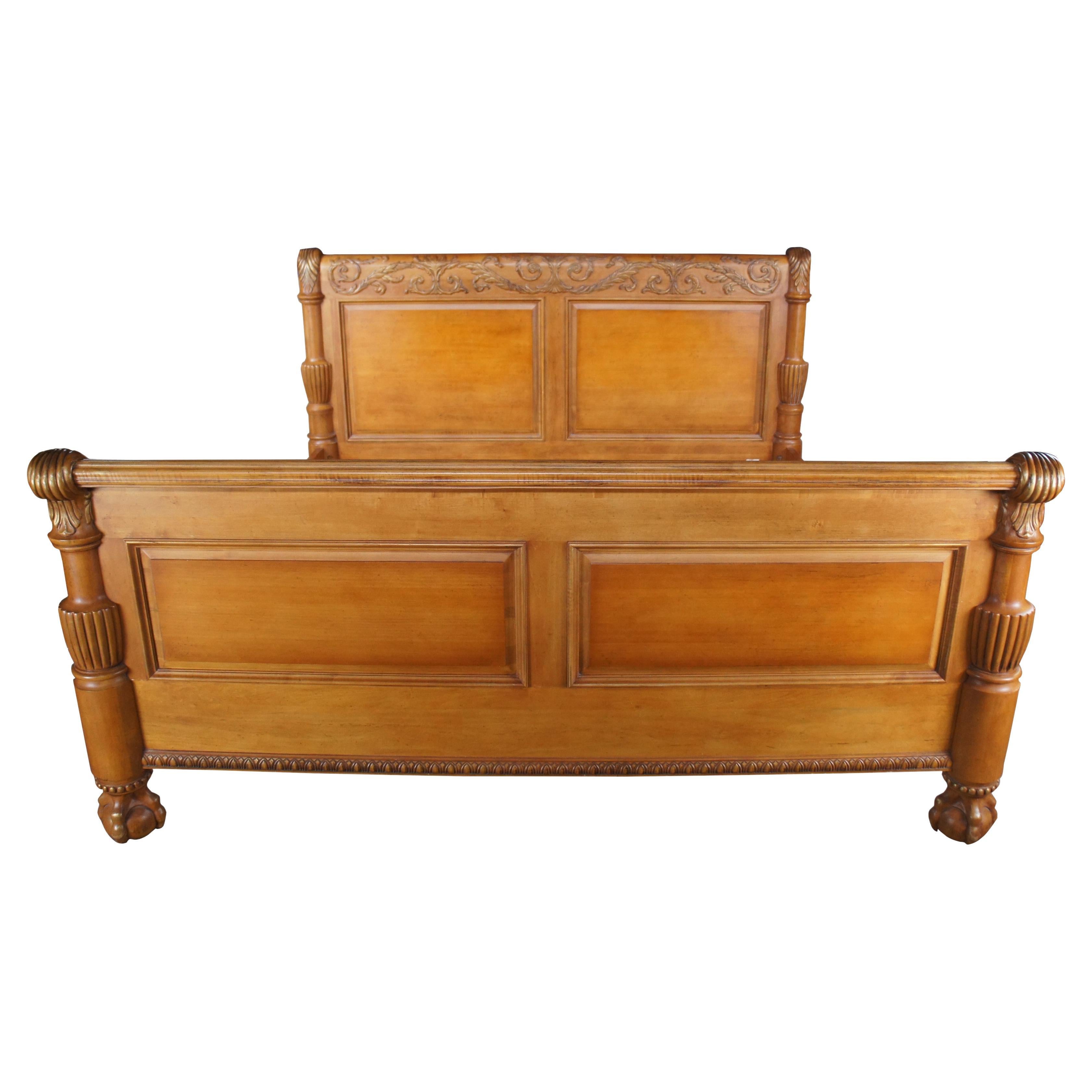 Century Furniture English Chippendale style sleigh bed, circa last quarter 20th century.  Made from mahogany with carved and paneled head and foot boards.  The posts feature a lovely scrolled acanthus motif over reeded baluster design leading to