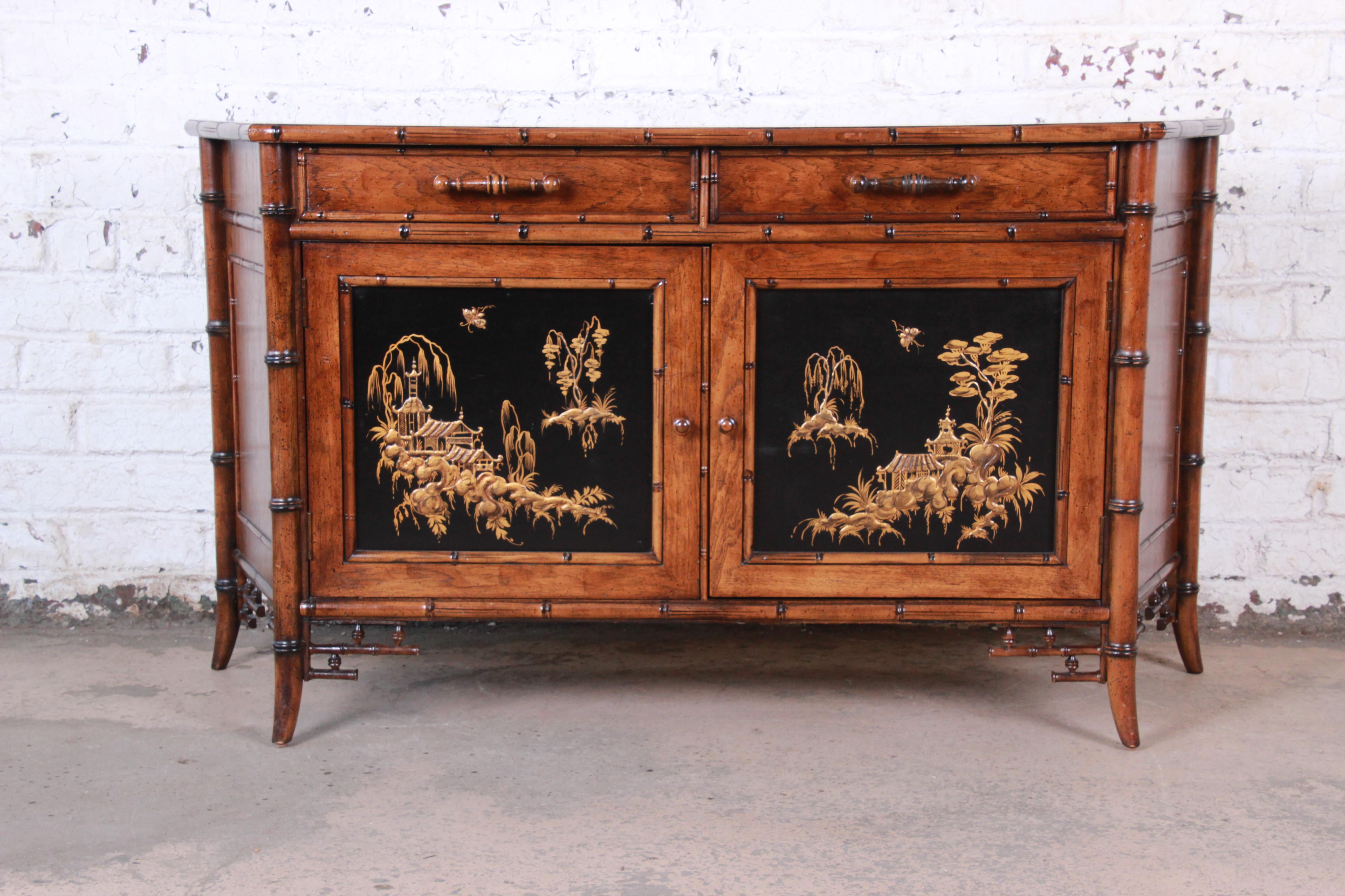 An exceptional midcentury Hollywood Regency chinoiserie faux bamboo credenza

Made by Century Furniture

Italy, circa 1970s

Walnut + faux bamboo + figurative Asian nature scenes

Measures: 61.25