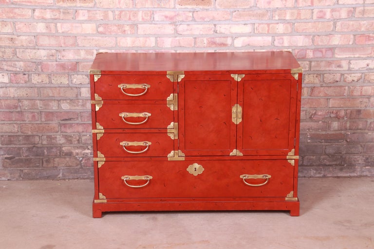 A gorgeous Mid-Century Modern Hollywood Regency Chinoiserie commode or chest of drawers

By Century Furniture

USA, Circa 1970s

Red lacquered wood, with original Asian-inspired brass hardware.

Measures: 41
