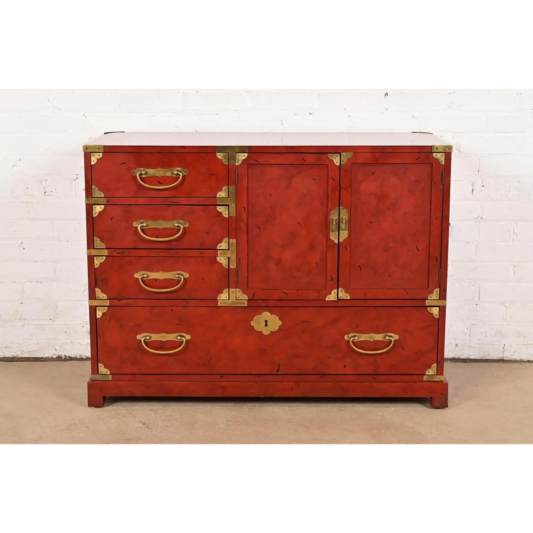 A gorgeous mid-century modern Hollywood Regency Chinoiserie commode or chest of drawers

By Century Furniture

USA, Circa 1970s

Red lacquered wood, with original Asian-inspired brass hardware.

Measures: 41