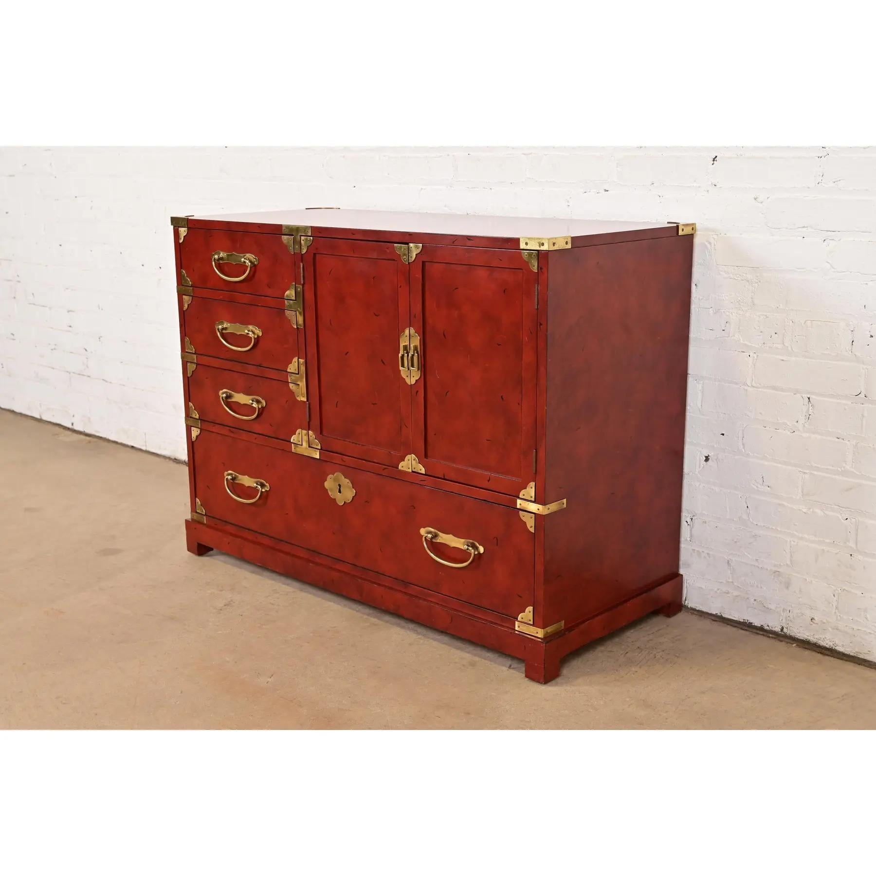 A gorgeous mid-century modern Hollywood Regency Chinoiserie commode or chest of drawers

By Century Furniture

USA, Circa 1970s

Red lacquered wood, with original Asian-inspired brass hardware.

Measures: 41