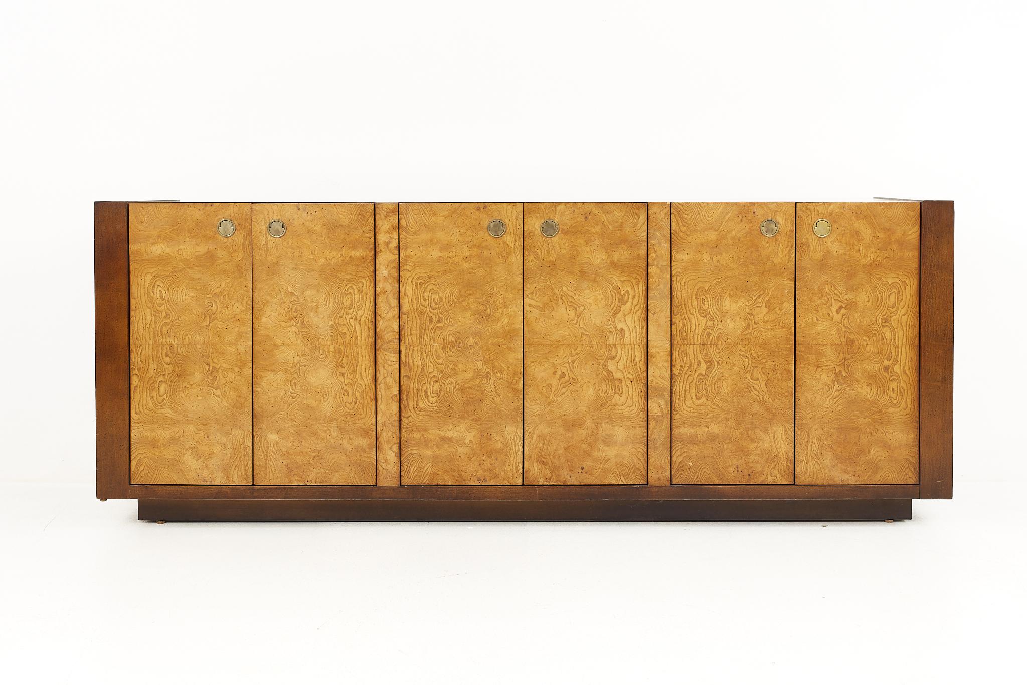 Century Furniture mid-century burlwood buffet credenza.

The credenza measures: 76 wide x 18 deep x 29.25 inches high

All pieces of furniture can be had in what we call restored vintage condition. That means the piece is restored upon purchase