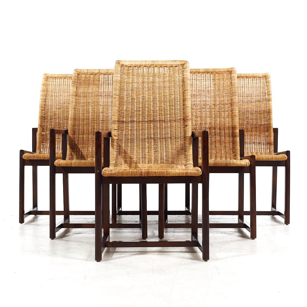 Century Furniture Mid Century Cane and Walnut Dining Chairs - Set of 6

Each armless chair measures: 21.25 wide x 22 deep x 39.25 high, with a seat height of 18 inches
Each captains chair measures: 21.25 wide x 22 deep x 39.25 high, with a seat