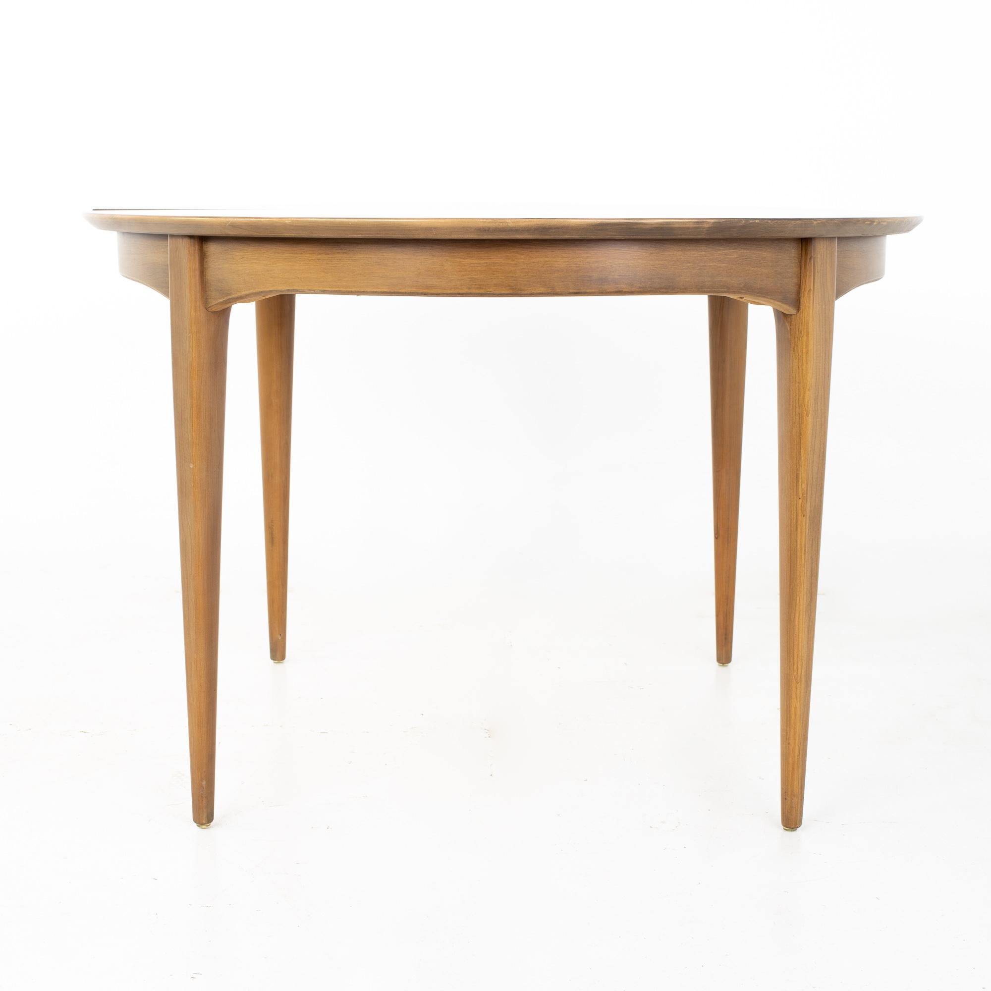 Late 20th Century Century Furniture Mid Century Round Oval Expanding Walnut Dining Table