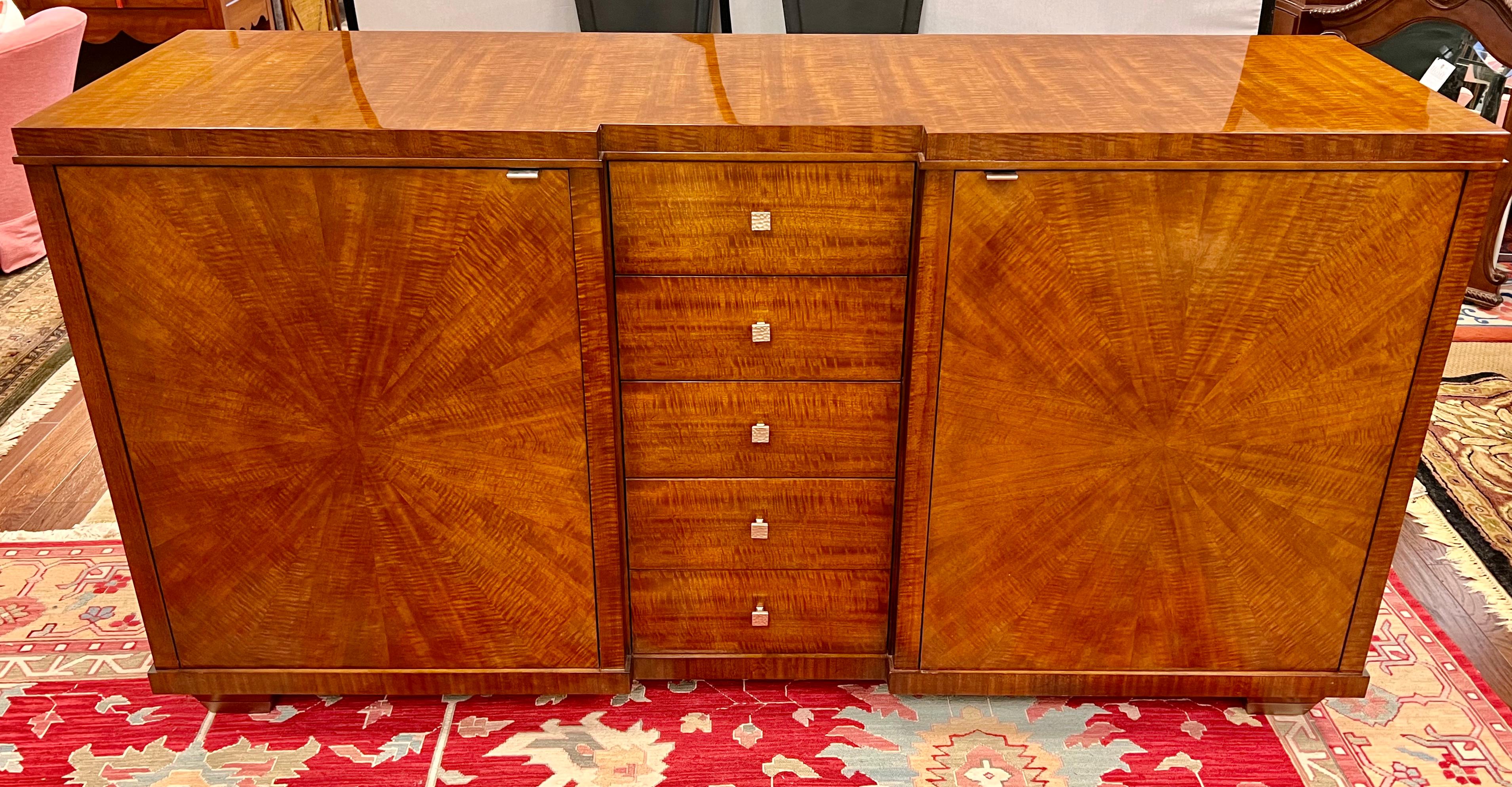 Stunning high-end Century Furniture sideboard credenza features an appealing sunburst design on the cabinet doors and a flame pattern to the top that add depth to the overall design. It comes with two door cabinets that offer ample storage space