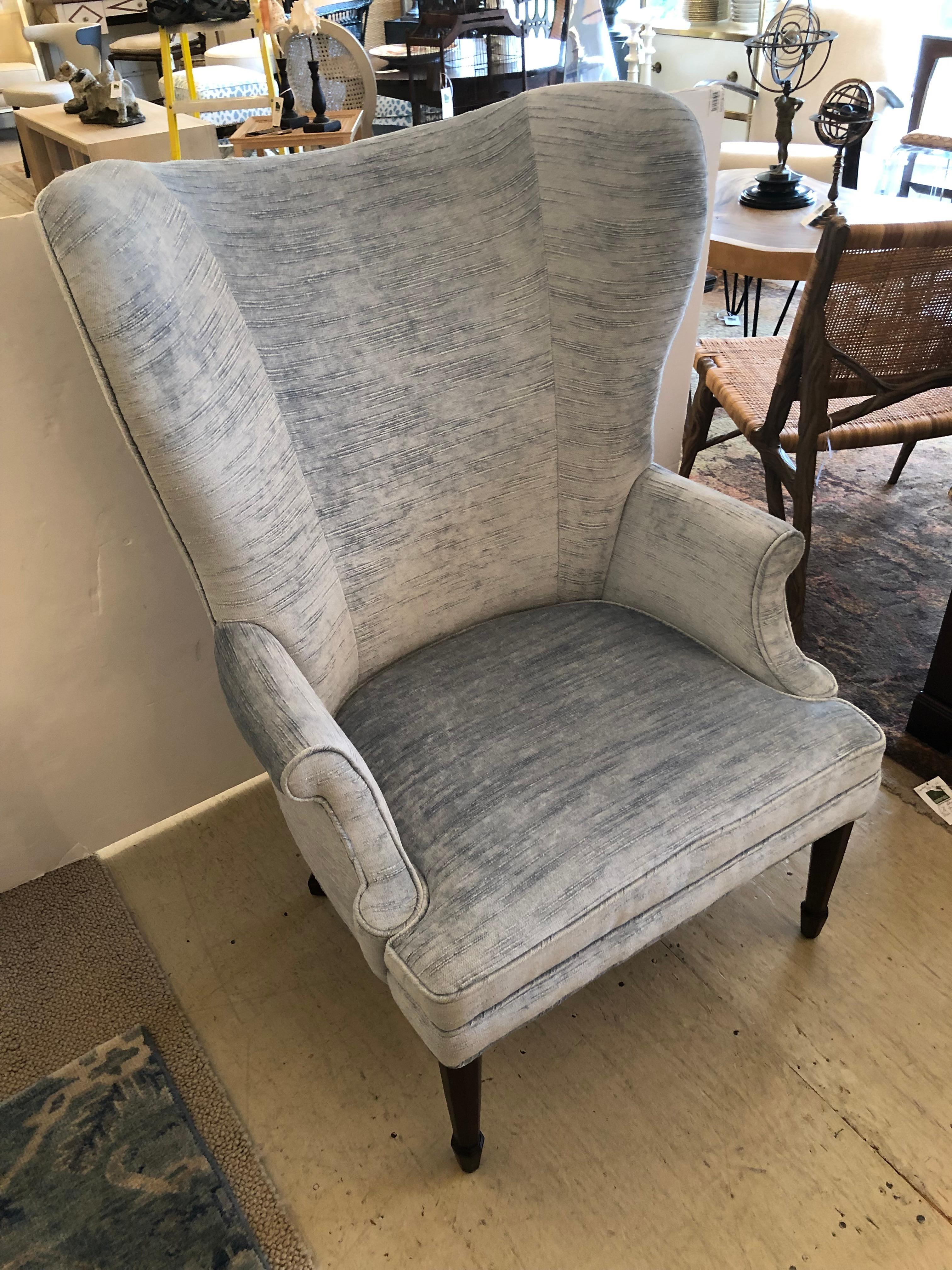 Super luxurious Century Furniture Santa Rosa wingback chair having sensuous modern silhouette and newly upholstered in a dreamy soft powder blue chenille.
arm height 23