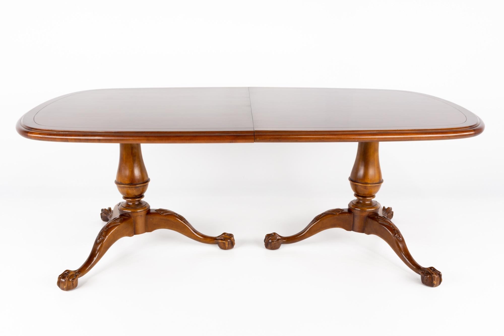 Century Furniture Traditional Clawfoot dining table with 2 leaves

This table measures: 82 wide x 46 deep x 30 high, with a chair clearance of 28 inches; each leaf is 20 inches wide, making a maximum table width of 122 inches when both leaves are
