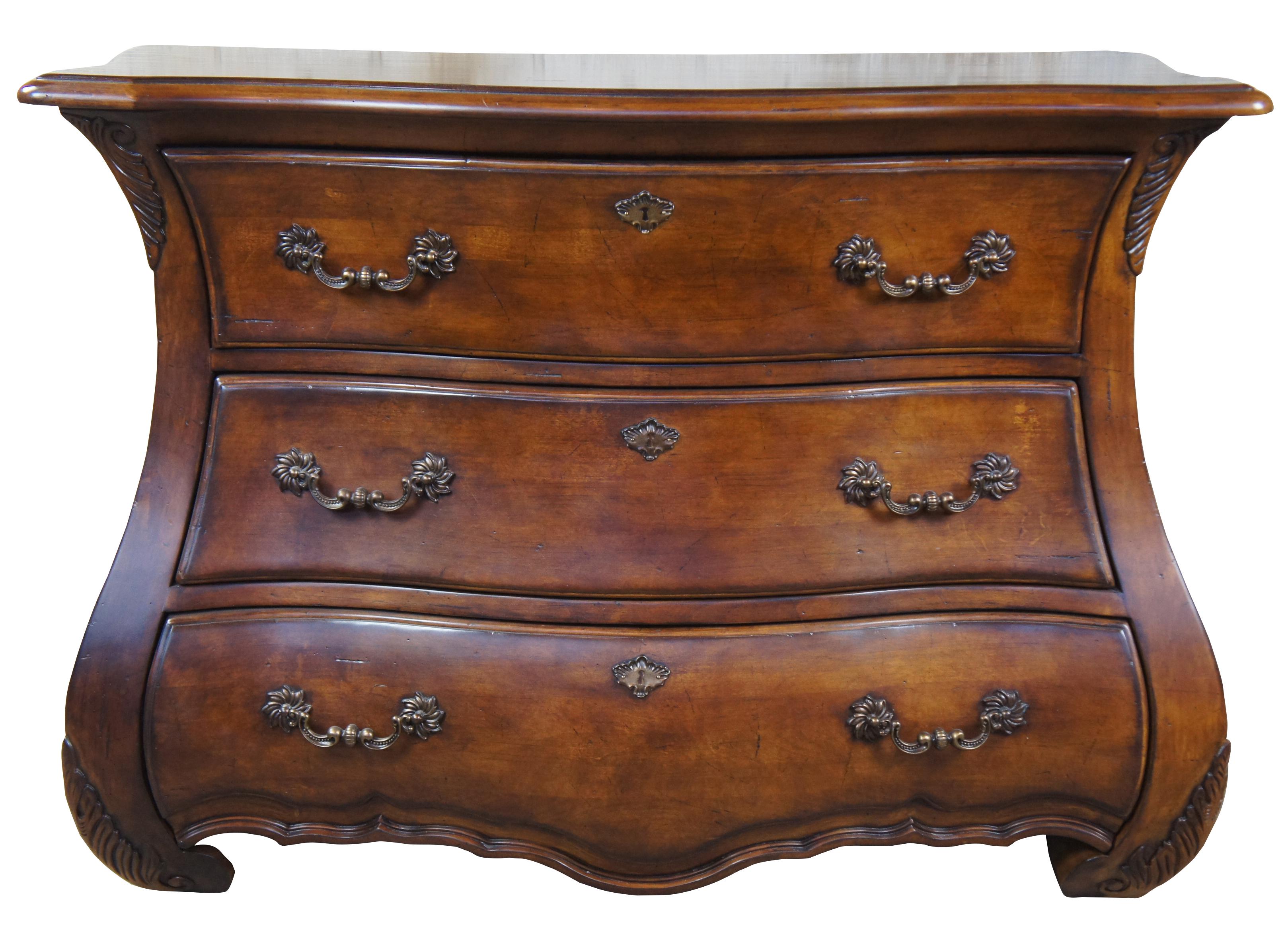 Century Furniture Bombe drawer chest. With a serpentine shape and bombé base, this chest makes a statement about your confident style. Featuring three drawers, the lowest one of which extends into a graciously curved apron. Leafy carvings flourish