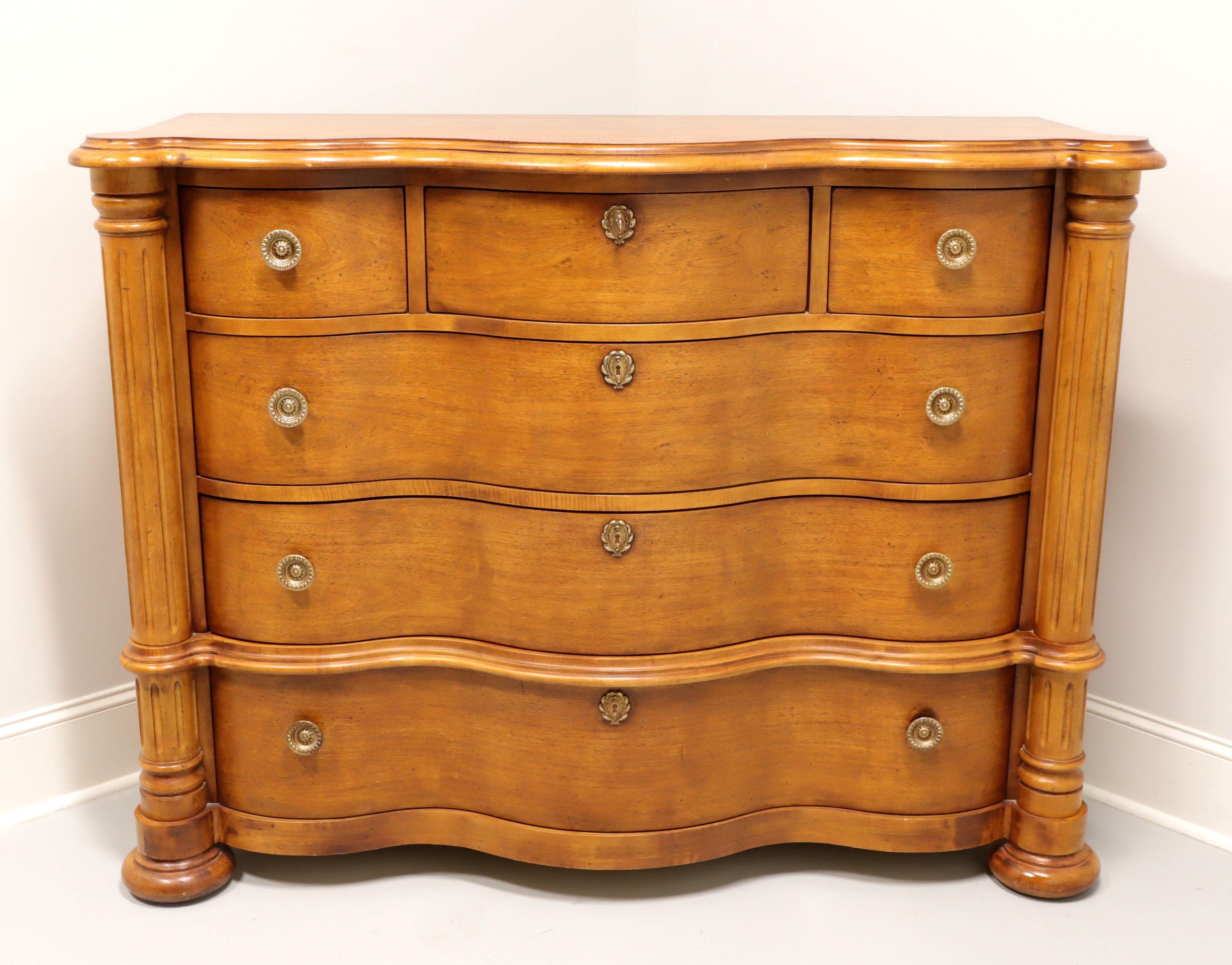 A monumentally sized, Transitional style, dressing chest by Century Furniture. Mahogany with a golden finish, brass hardware, columned sides, serpentine front and bun front feet. Features three smaller over three larger dovetail drawers with faux