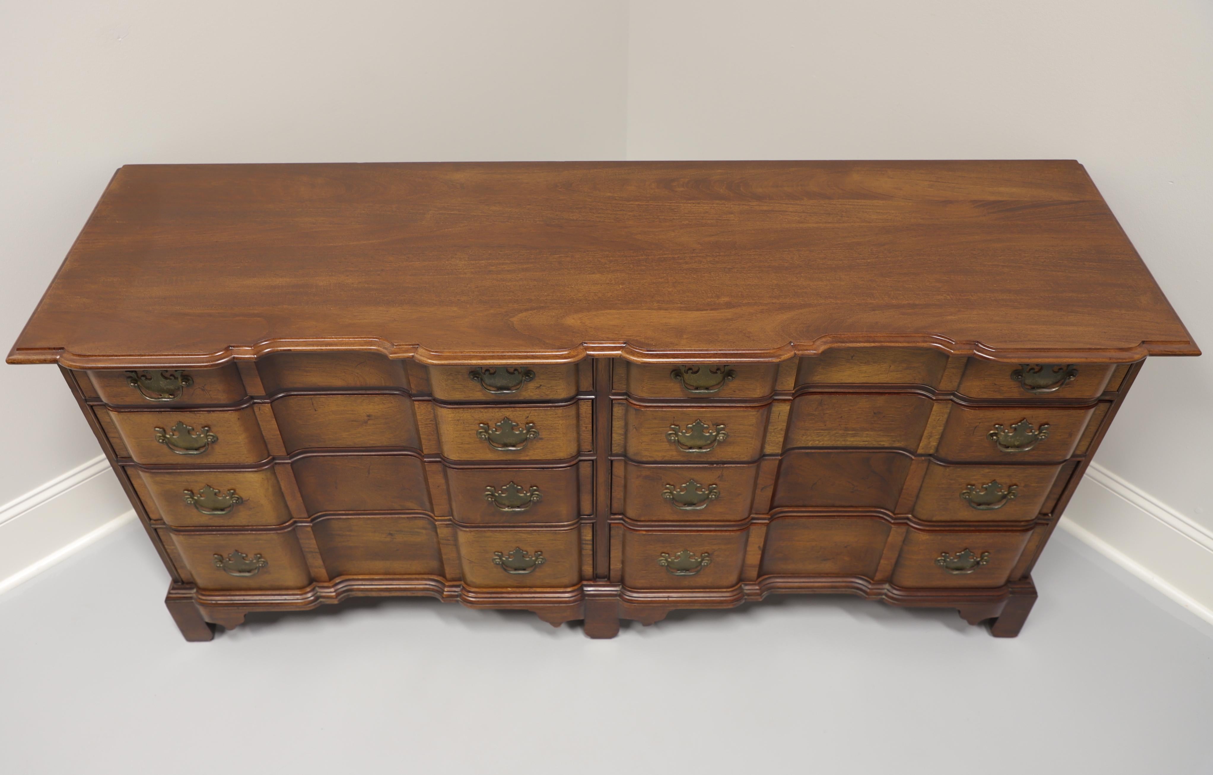 A Chippendale style double dresser by Century Furniture, from their Henry Ford Museum Collection. Solid mahogany with brass hardware, block front, ogee edge to top, and bracket feet. Features eight drawers of dovetail construction. Made in the USA,