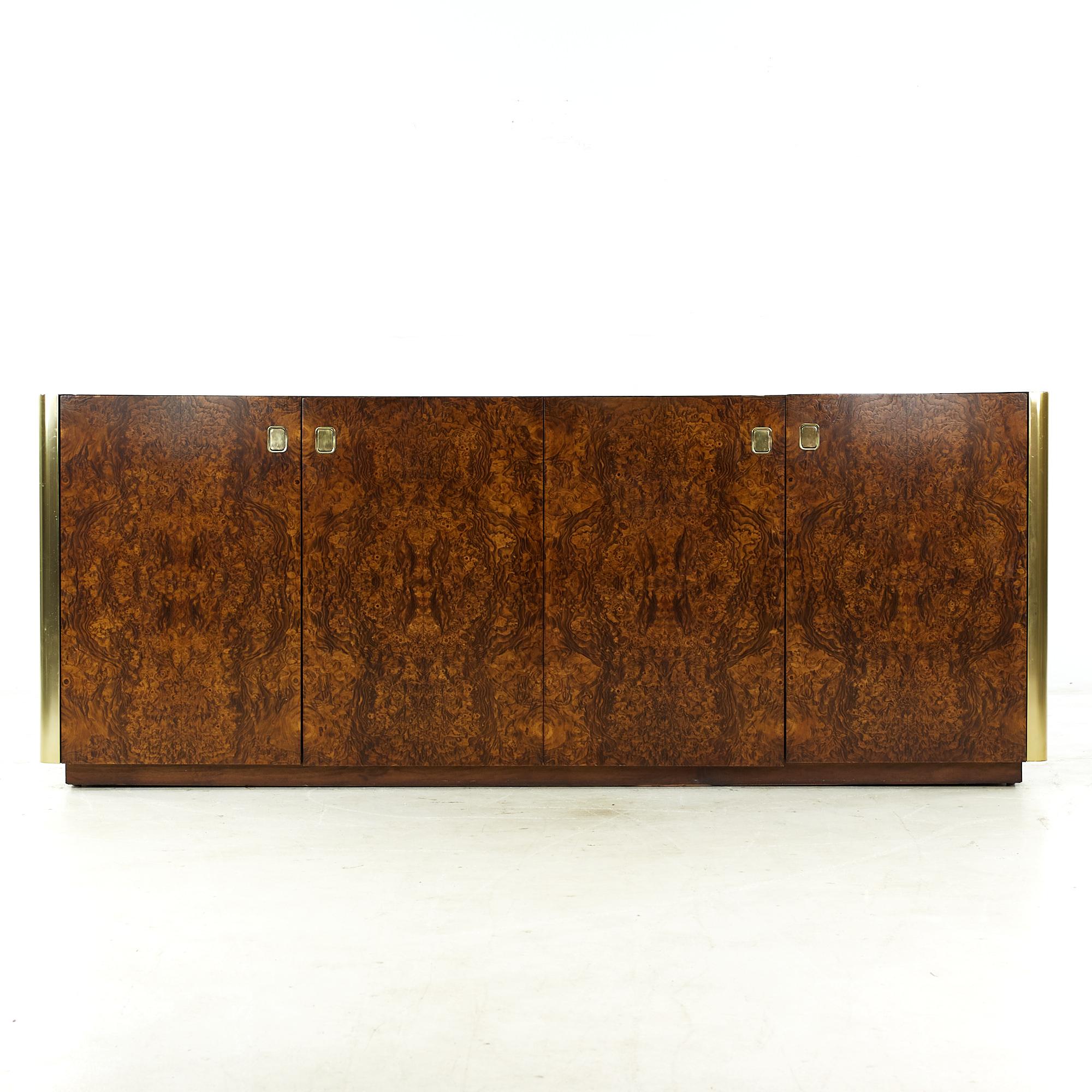 Century Mid Century Burlwood and brass 4 door credenza

This credenza measures: 76.25 wide x 18.25 deep x 30 inches high

All pieces of furniture can be had in what we call restored vintage condition. That means the piece is restored upon