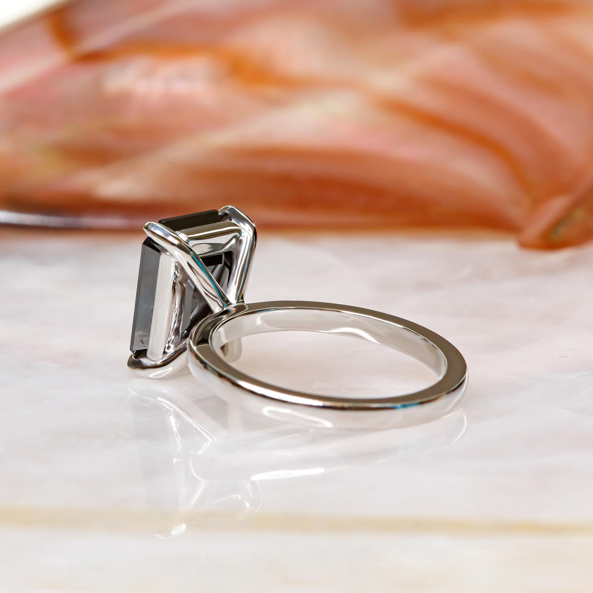 black diamond engagement ring emerald cut