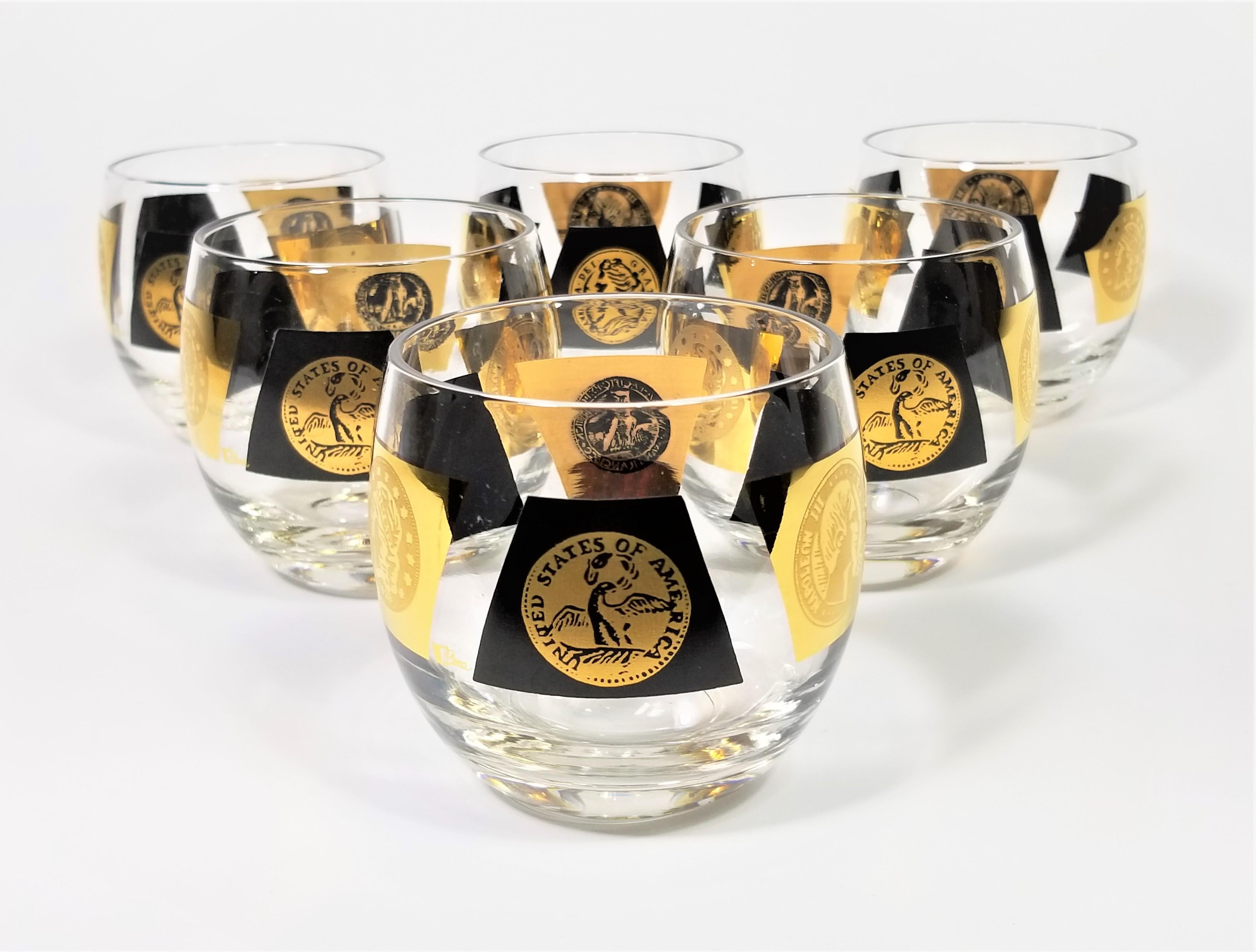 Midcentury 1960s Cera 22-karat gold and black glassware barware. Often referred to as roly poly glasses due to their round modern shape. All glasses are signed Cera.