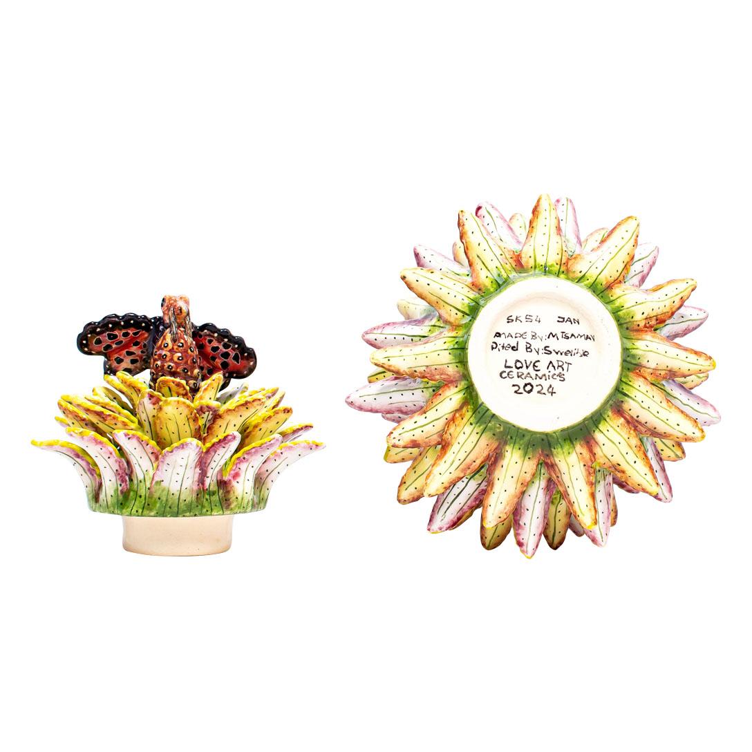 Crafted with care and creativity, this one-of-a-kind aloe vera-shaped box is a delightful fusion of nature and art. Handmade with meticulous attention to detail, its gentle curves and contours mimic the organic beauty of the aloe vera plant. The