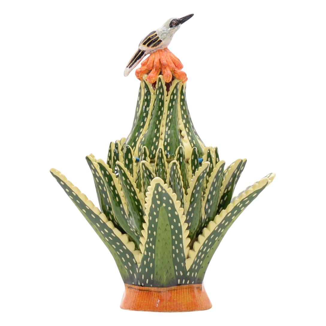 Aloe Jewelry Box Hand Painted by Sabelo Nene and Sculpted by Sbusiso Ndaba
Elevate your space with the captivating Aloe Jewelry Box, a stunning piece of decorative art from Love Art Ceramic in South Africa. Sculpted by the talented Sbusiso Ndaba and