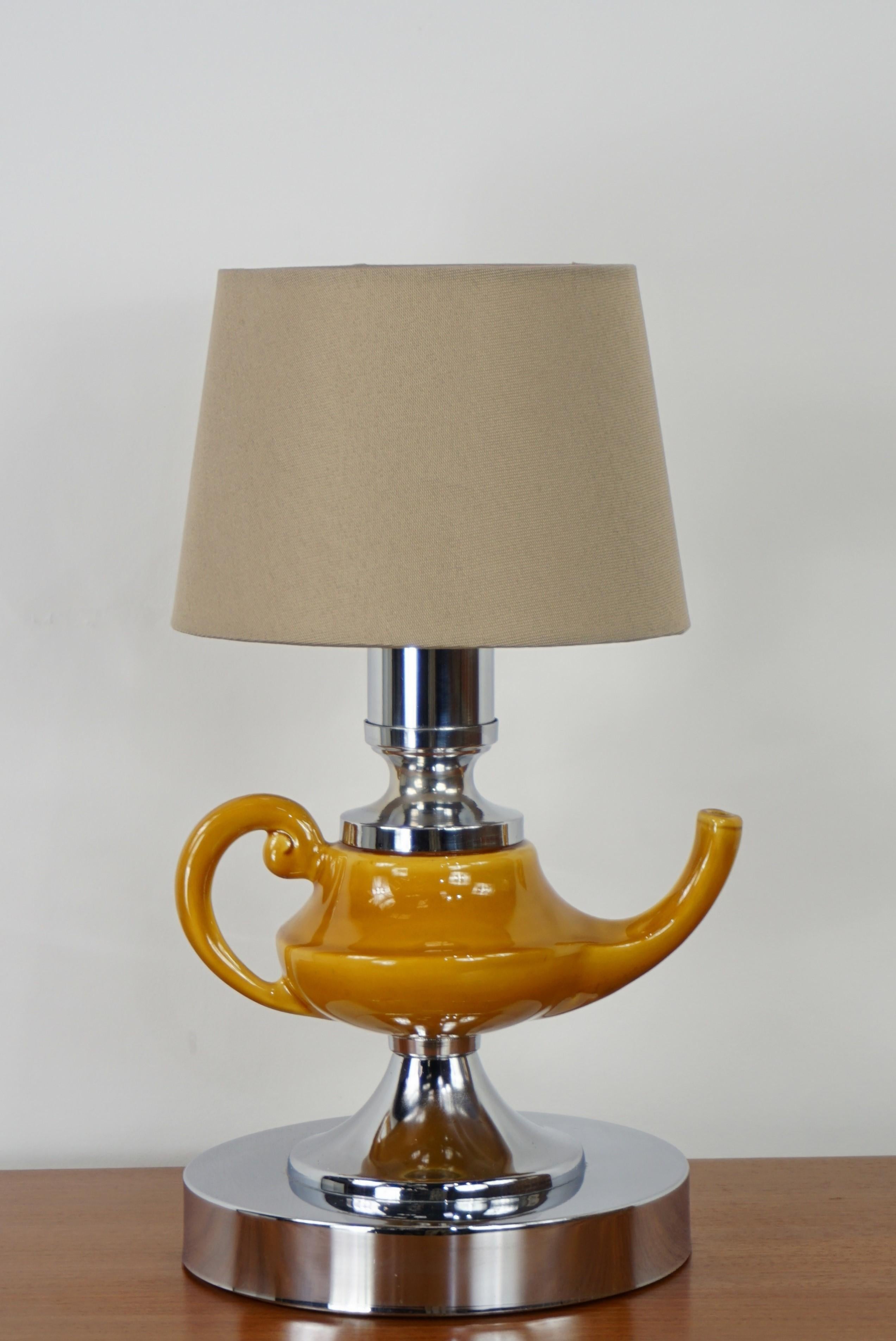 1970s design lamp composed of a chrome metal base adorned with ceramic samovar shaped.