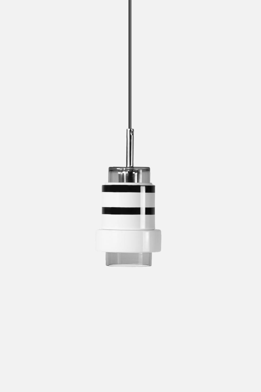 Ceramic and glazed copper suspension by Eric Willemart
Materials : Grey blown glass black and white handcrafted ceramic
 Polished silver plating
 Light specifications: Socket E27, Bulb PARATHOM R63 (optional)
 Ceiling rose: Black painted cylinder