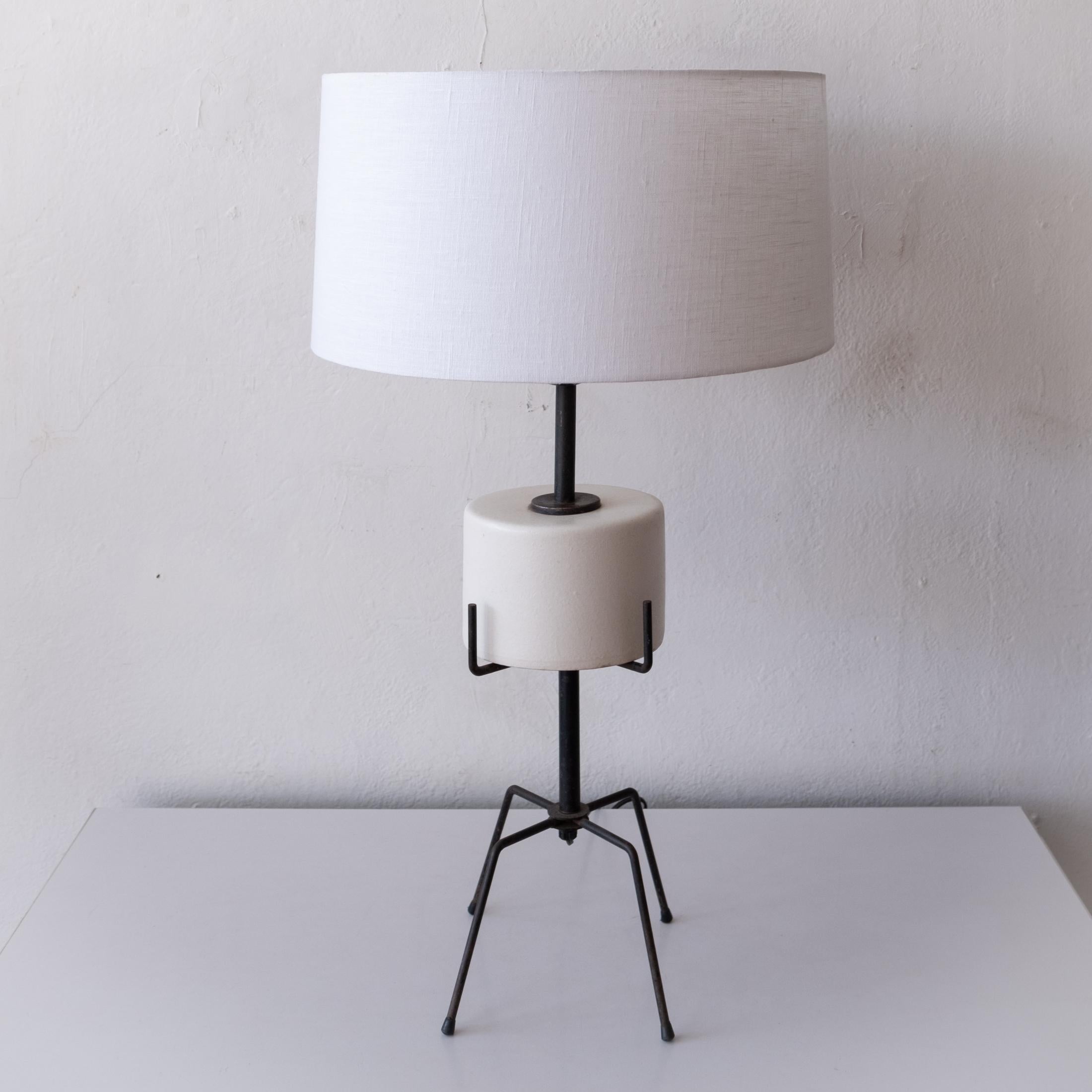 Rare sculptural Mid-Century ceramic and iron table lamp by prolific designer, Ben Seibel.  USA 1950s

Original wiring functions properly.  The glass diffuser will be included.  
