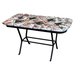 Mesa de cerámica y hierro de Alice Colonieu