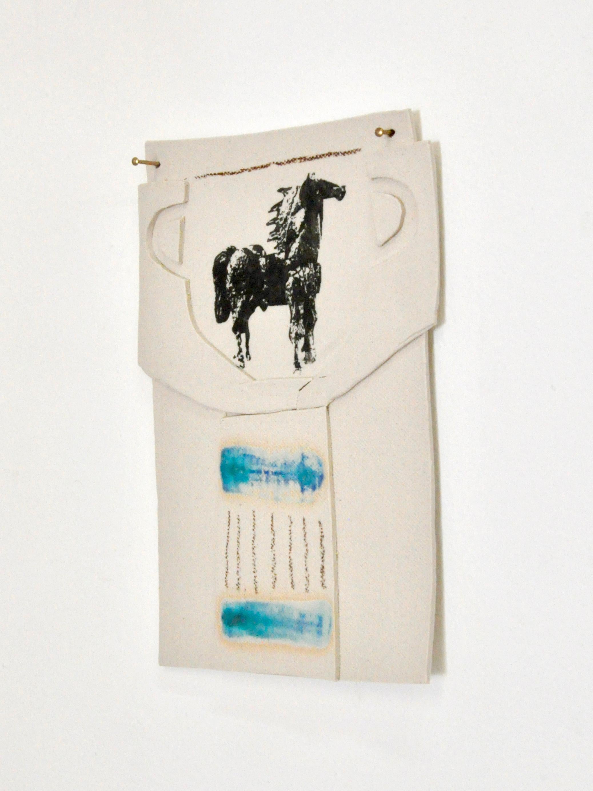 This ceramic and mixed-media vase collage by Alison Owen is a playful yet elegant wall piece made from thin slabs of white stoneware paper clay and mixed-media. The piece is layered with clay cut-outs, screen printed underglaze horse design, and