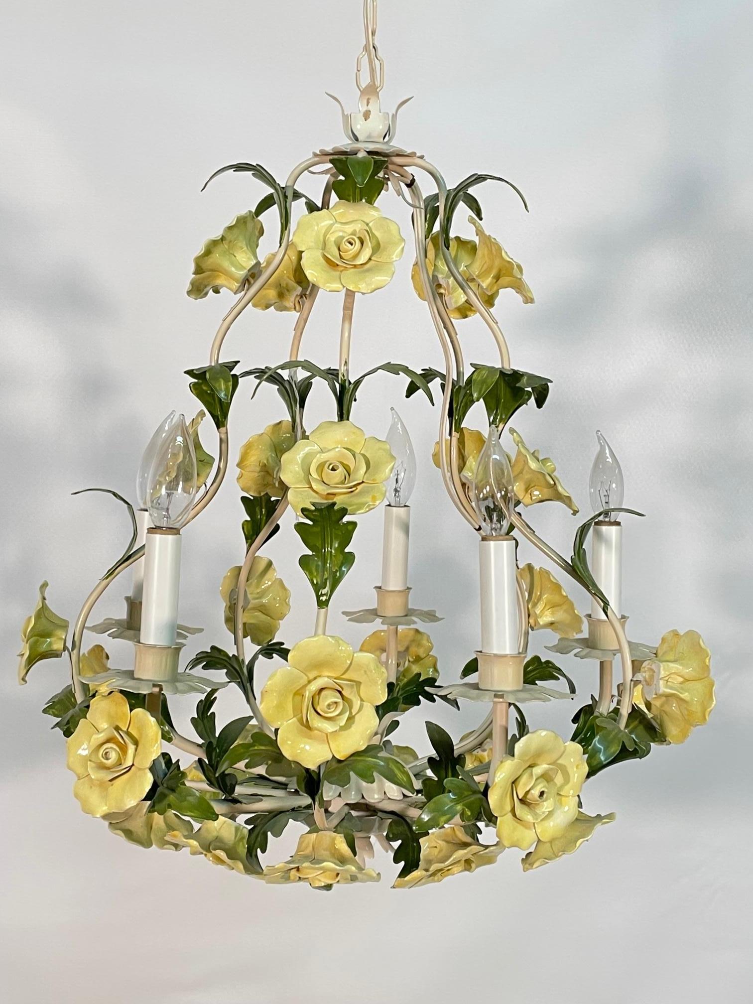 Vintage tole metal chandelier features ceramic hand painted roses and metal leaves. Believed to be made in Italy, but no markings. Very good condition with minor imperfections consistent with age.
Shipping to most of the continental US is $200 to