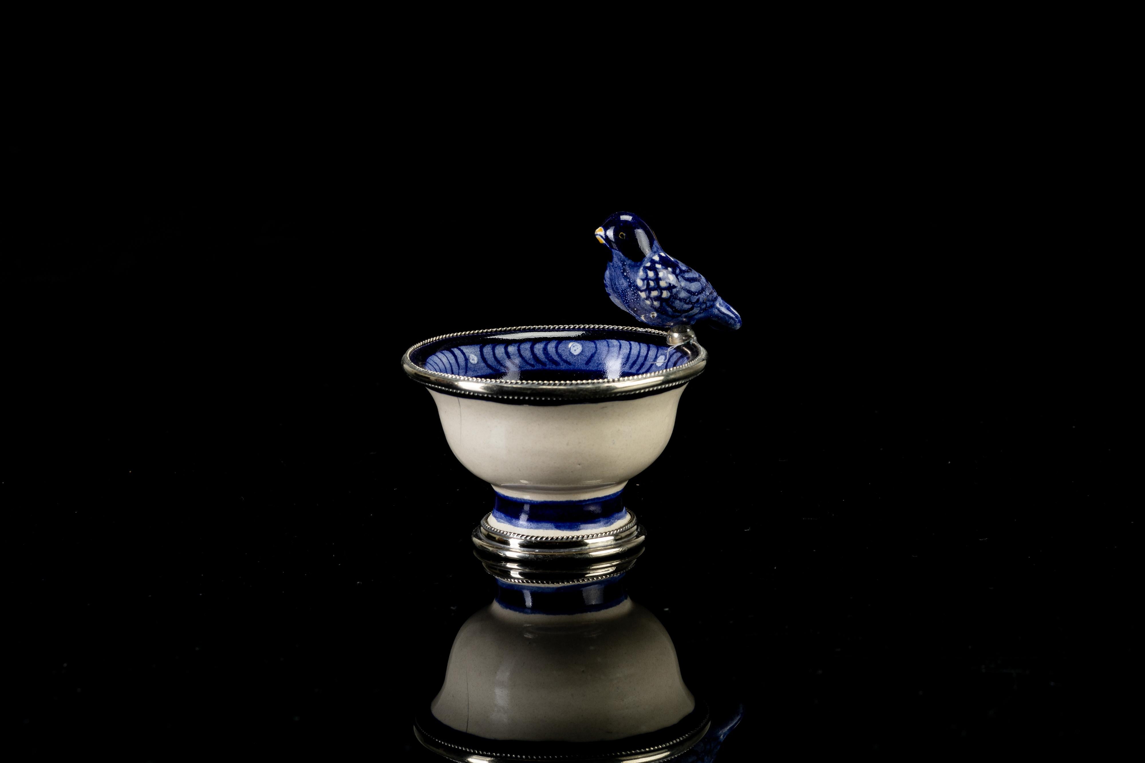 Always unique pieces are what you are going to hear about Jesus Guerrero Santo's work, all the pieces are handmade and created one by one it takes months to produce each peace. This ceramic and white metal (alpaca) bowl centerpiece, was created in