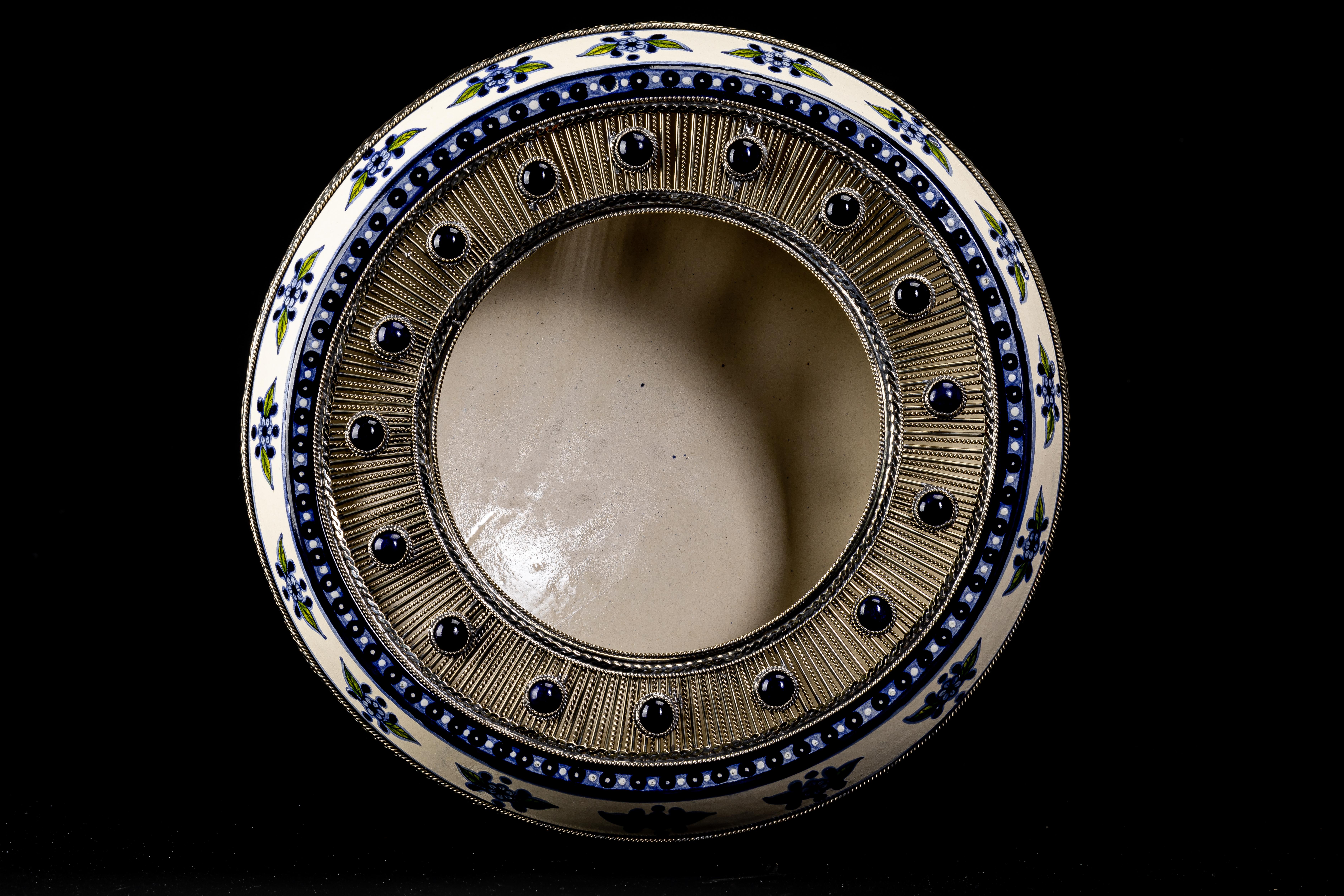Always unique pieces are what you are going to hear about Jesus Guerrero Santo's work, all the pieces are handmade and created one by one it takes months to produce each peace. This ceramic and white metal (alpaca) bowl centerpiece, was created in