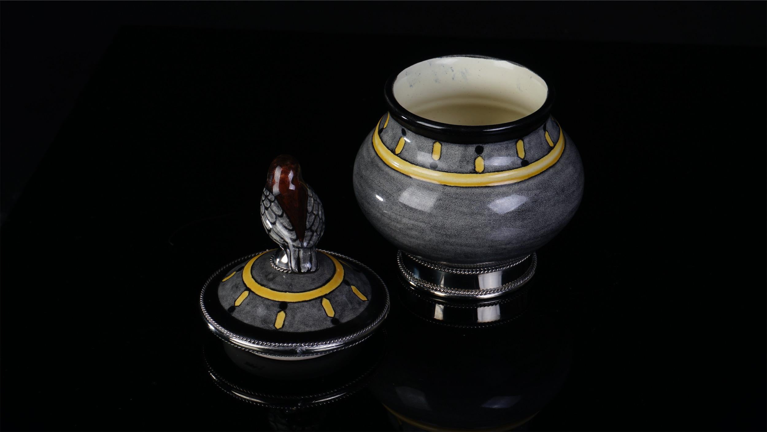 Always unique pieces is what you are going to hear about Jesus Guerrero Santo's work, all the pieces are handmade and created one by one it takes months to produce each peace.
This ceramica and white metal (alpaca) bowl centrepiece, was created in
