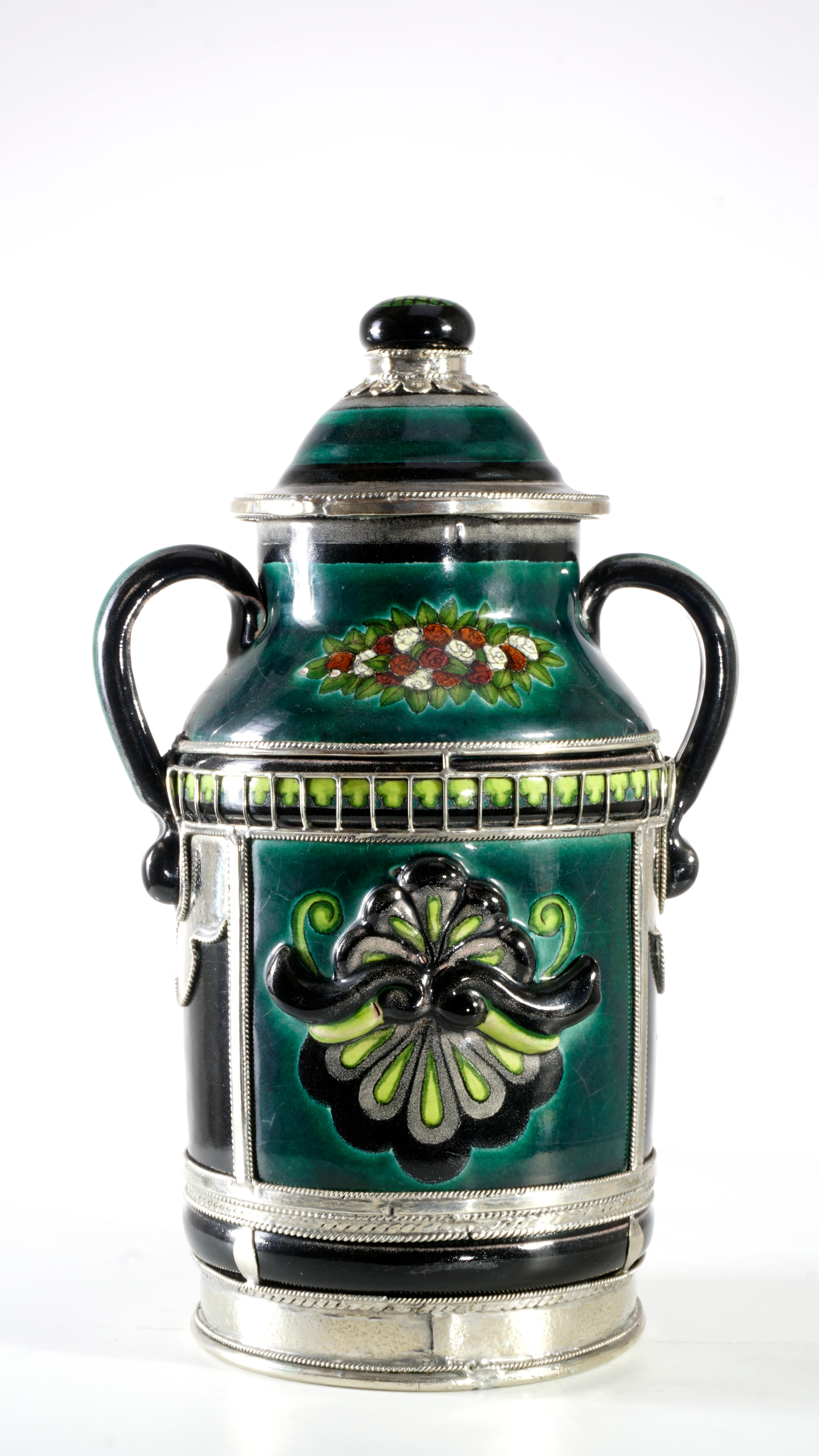 Always unique pieces is what you are going to hear about Jesus Guerrero Santo's work, all the pieces are handmade and created one by one it takes months to produce each peace.
This ceramica and white metal (alpaca) Pharmacy jar, was created in
