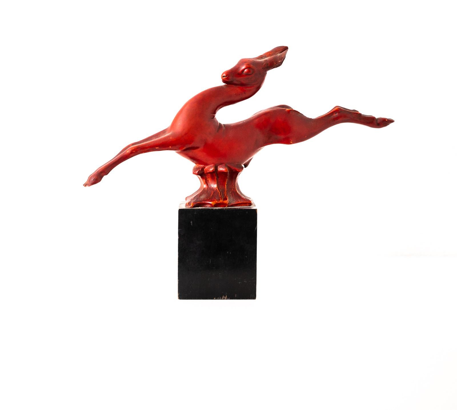 Art Deco stoneware sculpture of an antelope enameled in red. 

Signature engraved: G. Cacciapuoti, stamped “Fabrique en Italie” to the socle, labels to the base.

Bibliography: AA.VV. Le ceramiche di Cacciapuoti da Napoli a Milano 1870-1953,