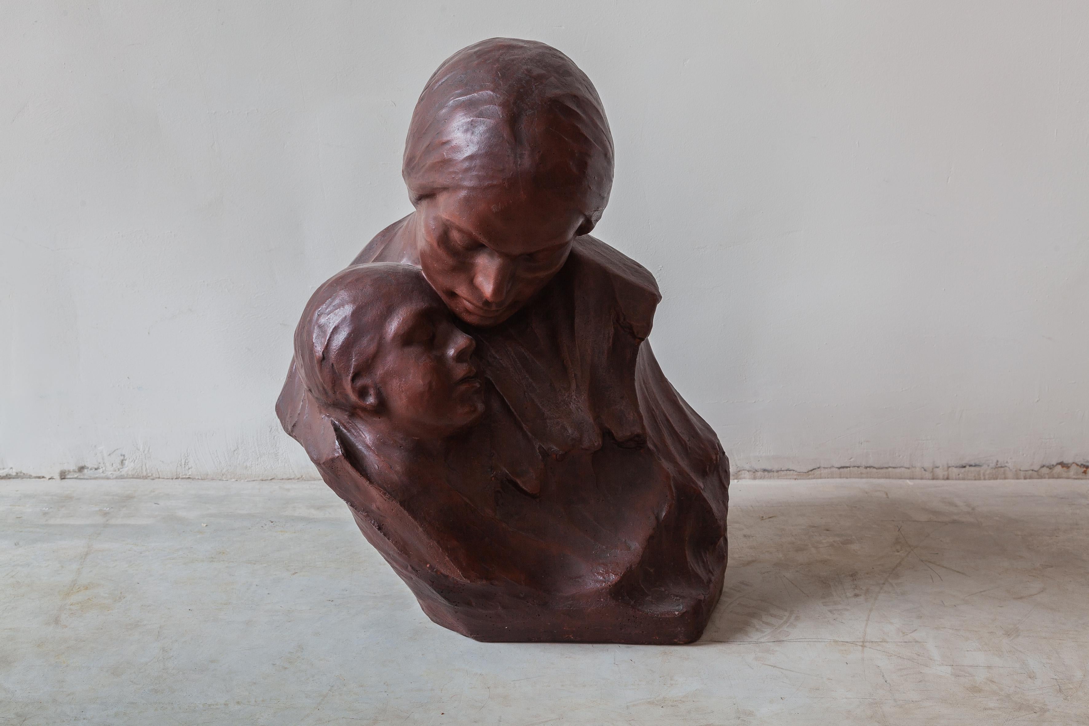 Art Deco large sculpture in ceramic of a Mother and Child by Belgian sculpture, Georges Wasterlain. Glazed reddish-brown stoneware with no chips or defects.
George Wasterlain was a Belgian draftsman, painter and sculptor. Wasterlain, self-taught,