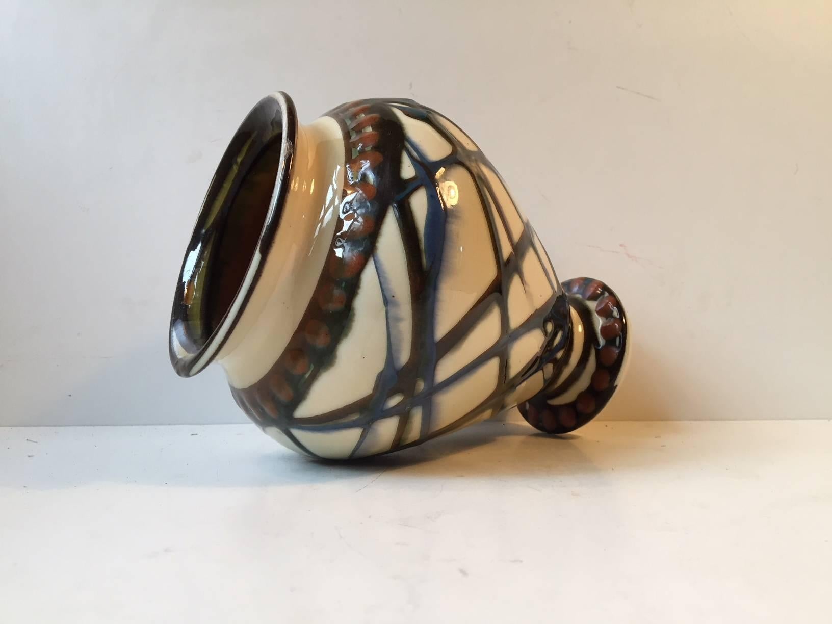 Glazed footed vase with swirling stripes and red dots by Herman August Kähler. Signed HAK - Denmark to the base. Splendid intact vintage/antique un-restored condition.