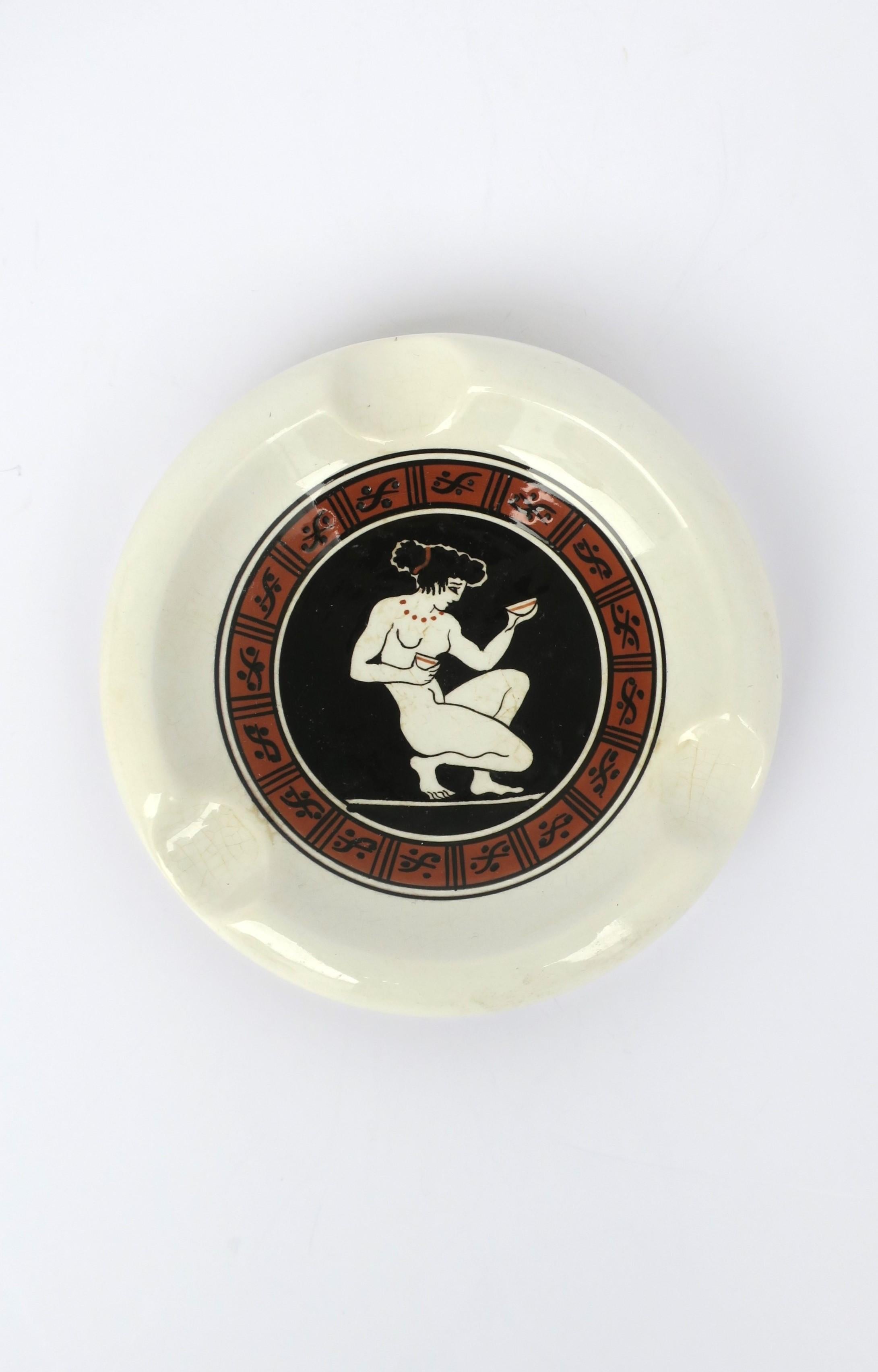 A ceramic ashtray or vide-poche catch-all with Greek Goddess, Aphroditie, in the classical Greek style, circa mid-20th century, Greece. Piece is hand-made as marked with Goddess Aphroditie at center. Great as its intended use, or as a catch-all for