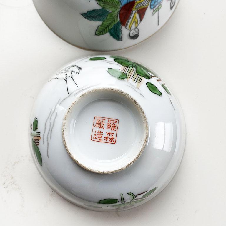 Chinoiserie Ceramic Asian Tea Bowls or Cups with Floral and Figurative Motif, a Pair